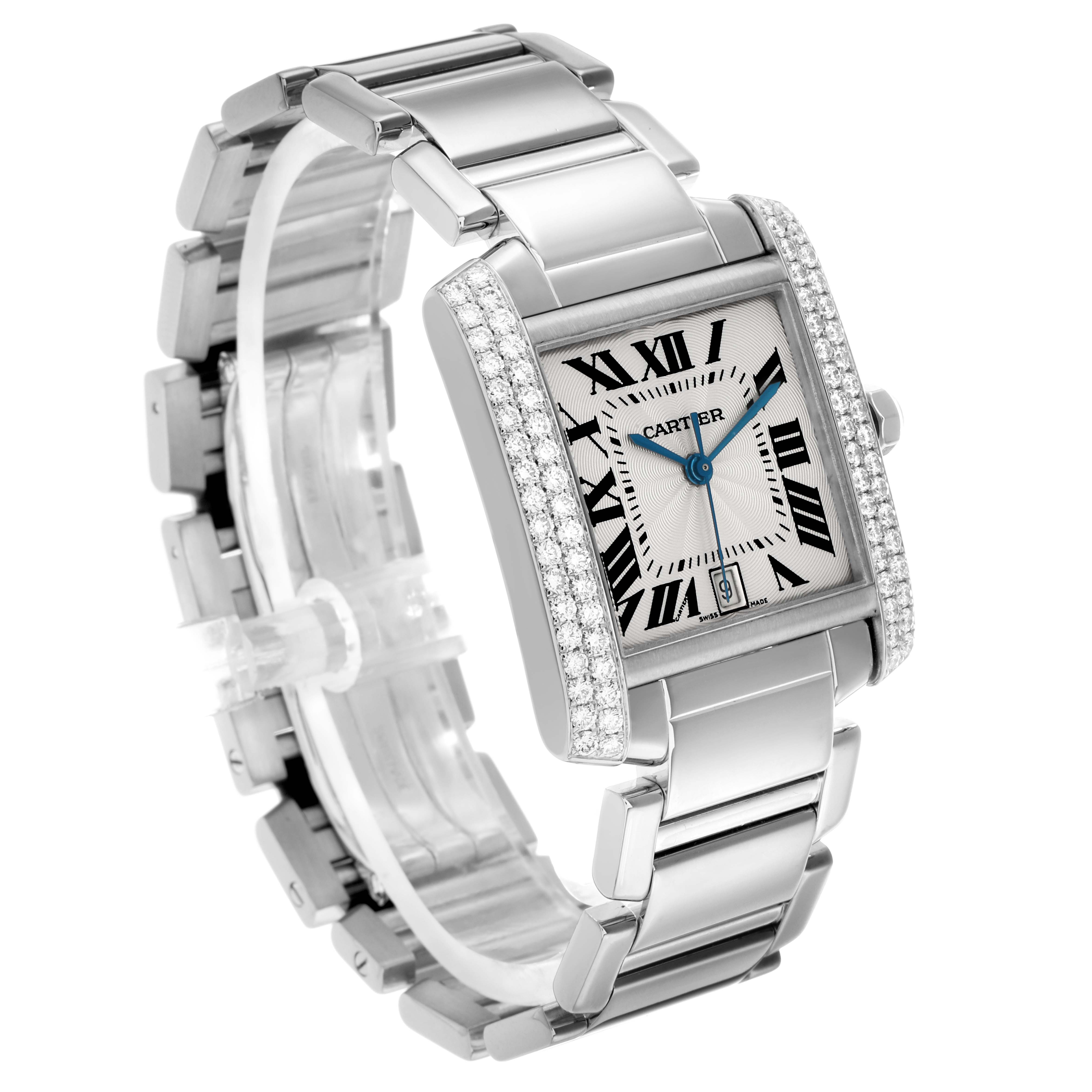 The Cartier Tank Francaise WE1003S3 Men
s White Gold Silver Dial watch is shown at a slight angle, highlighting its face, diamond-set bezel, and stainless steel bracelet.