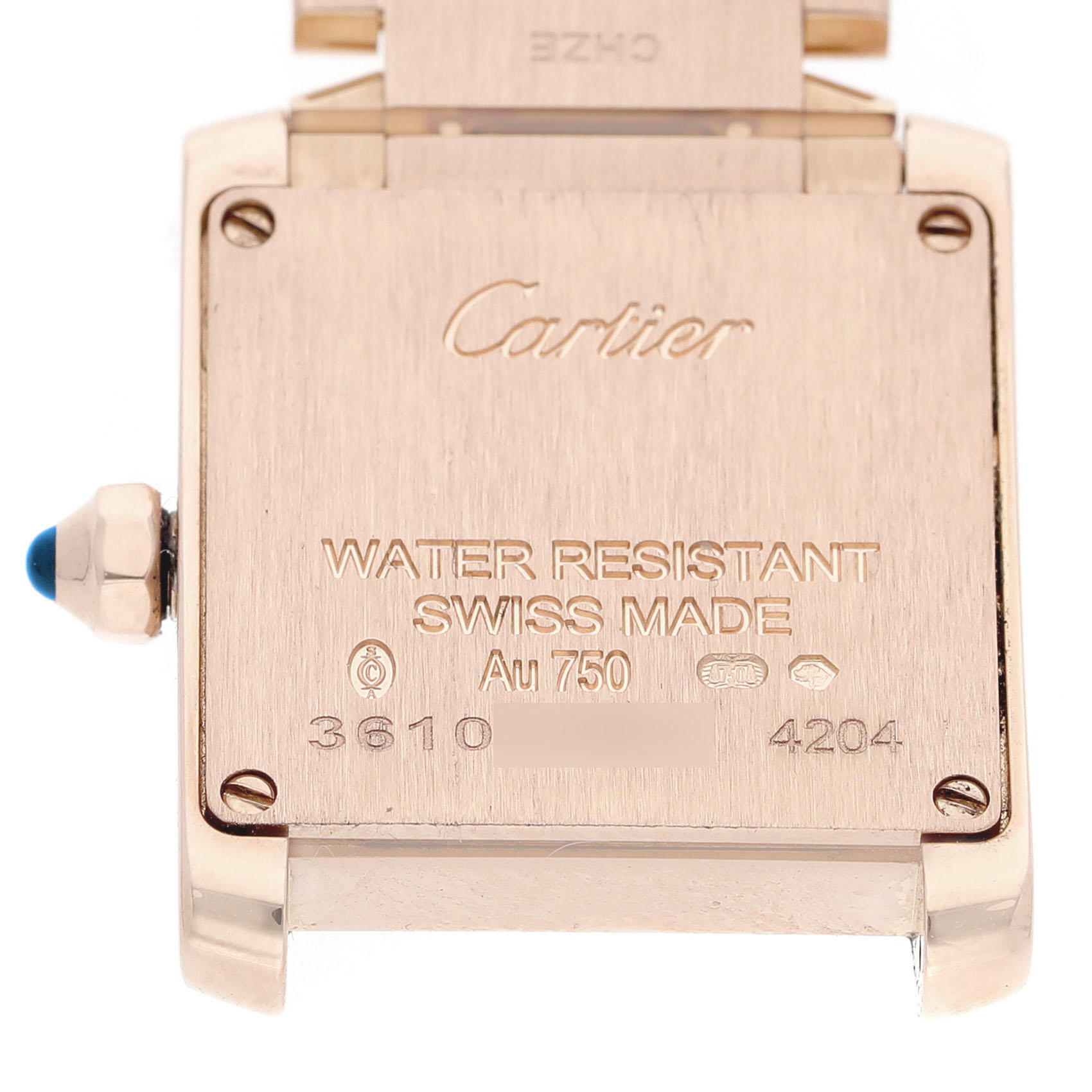 The image shows the back of a Cartier Tank Francaise WGTA0029 Women's Rose Gold Silver Dial watch, highlighting its inscriptions and crown detail.