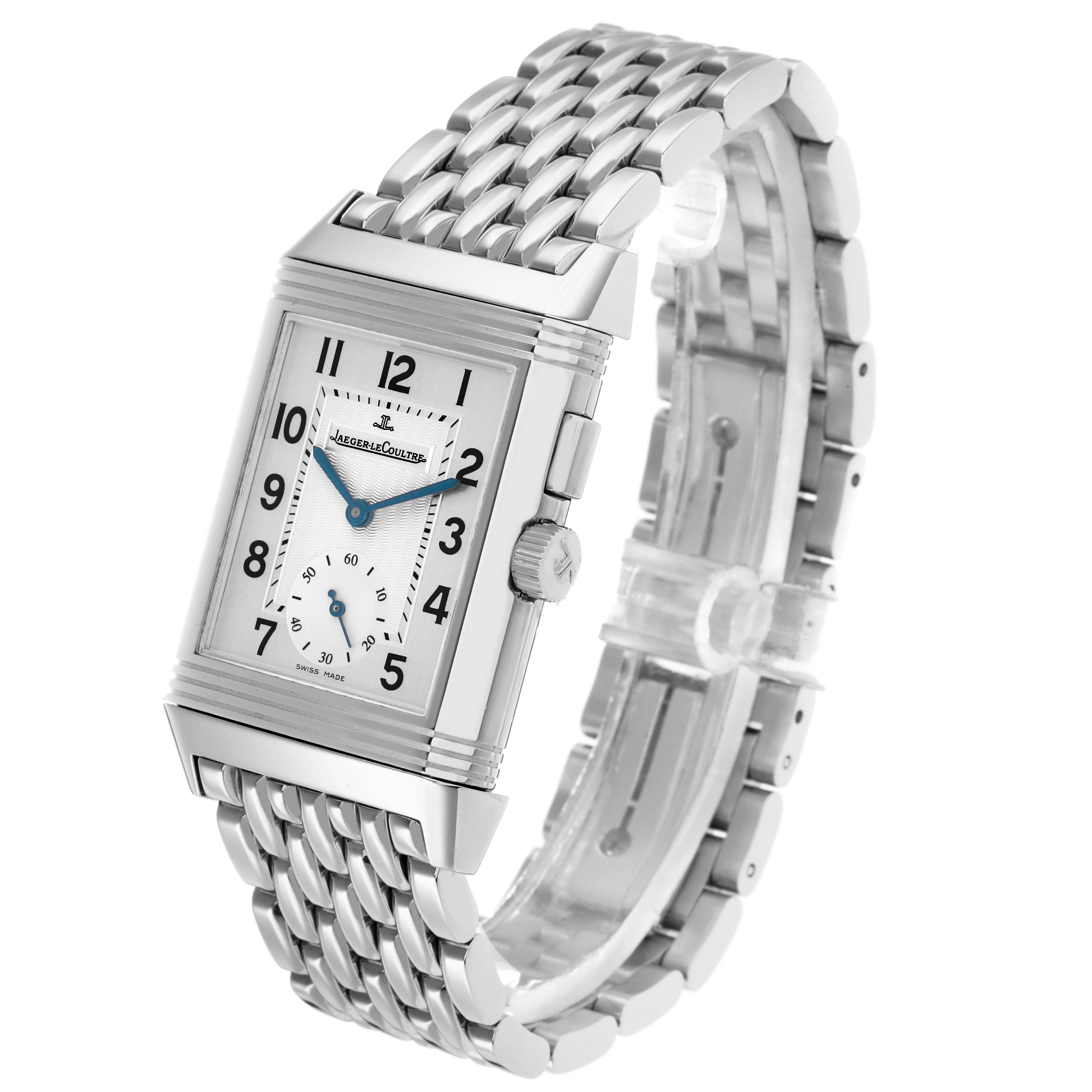 The Jaeger-LeCoultre Reverso is shown at a three-quarter angle, displaying its rectangular face, crown, and metal bracelet.
