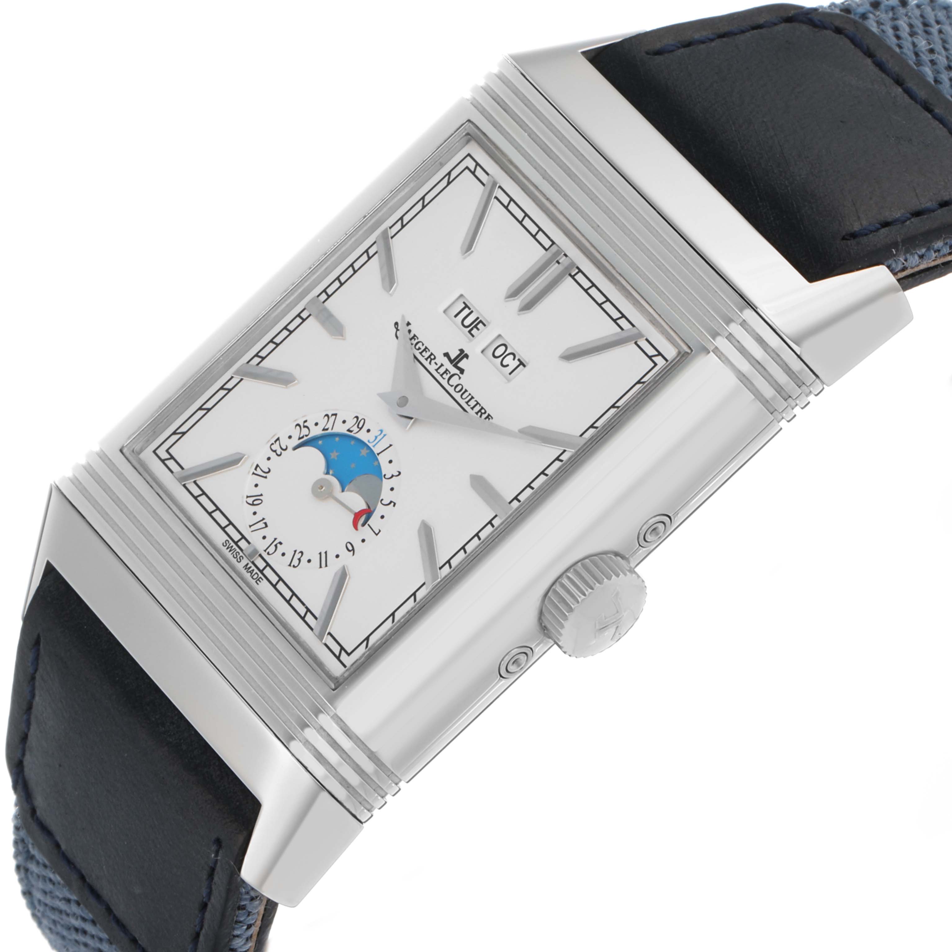The Jaeger-LeCoultre Reverso watch is shown from a diagonal angle, highlighting its face, crown, and leather strap.