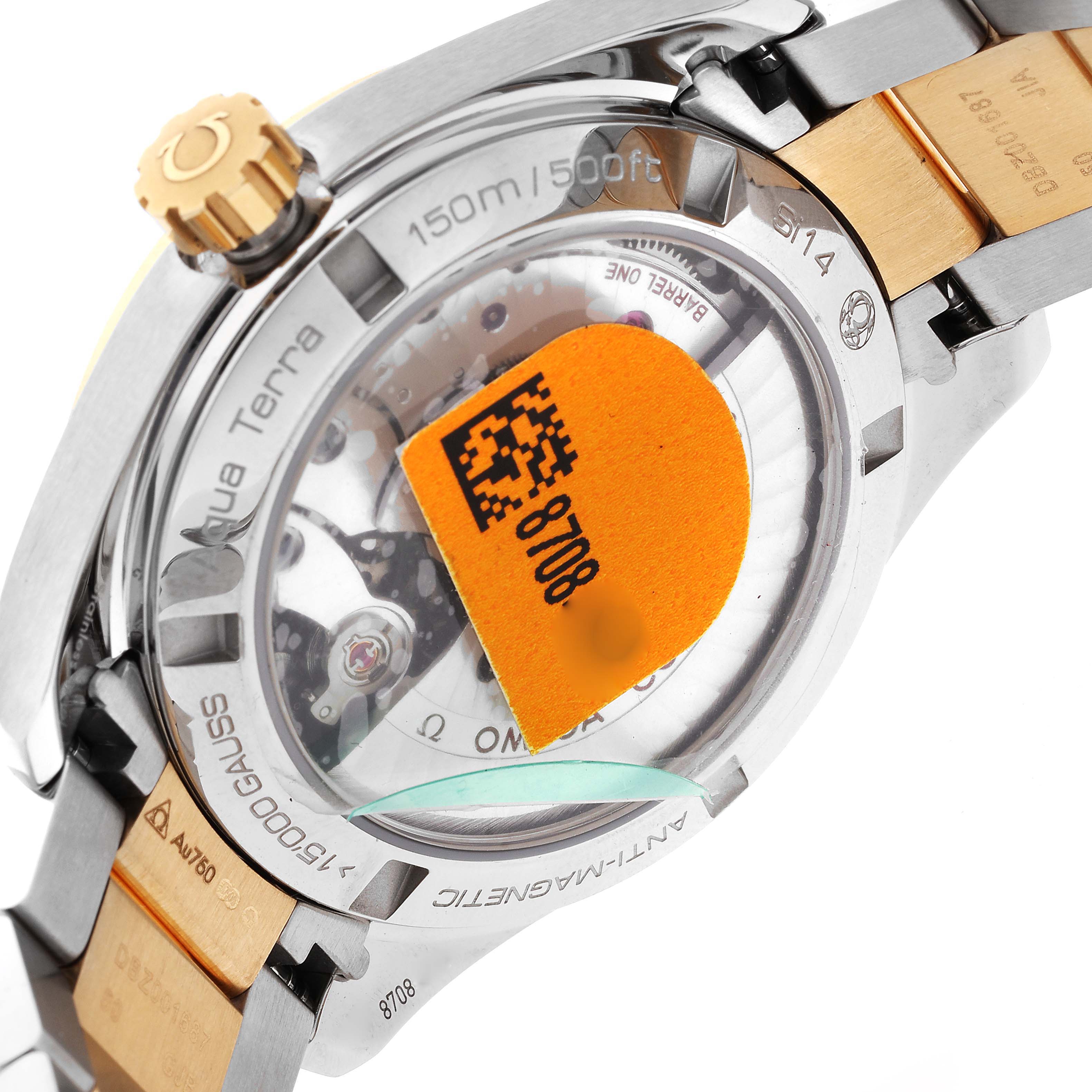 The image shows the back view of the Omega Aqua Terra 231.20.39.21.02.002 Men's Steel and Gold (two tone) Silver Dial 231.20.39.21.02.002 Men's Steel and Gold (two tone) Silver Dial watch, displaying its transparent case back and adjacent bracelet links.