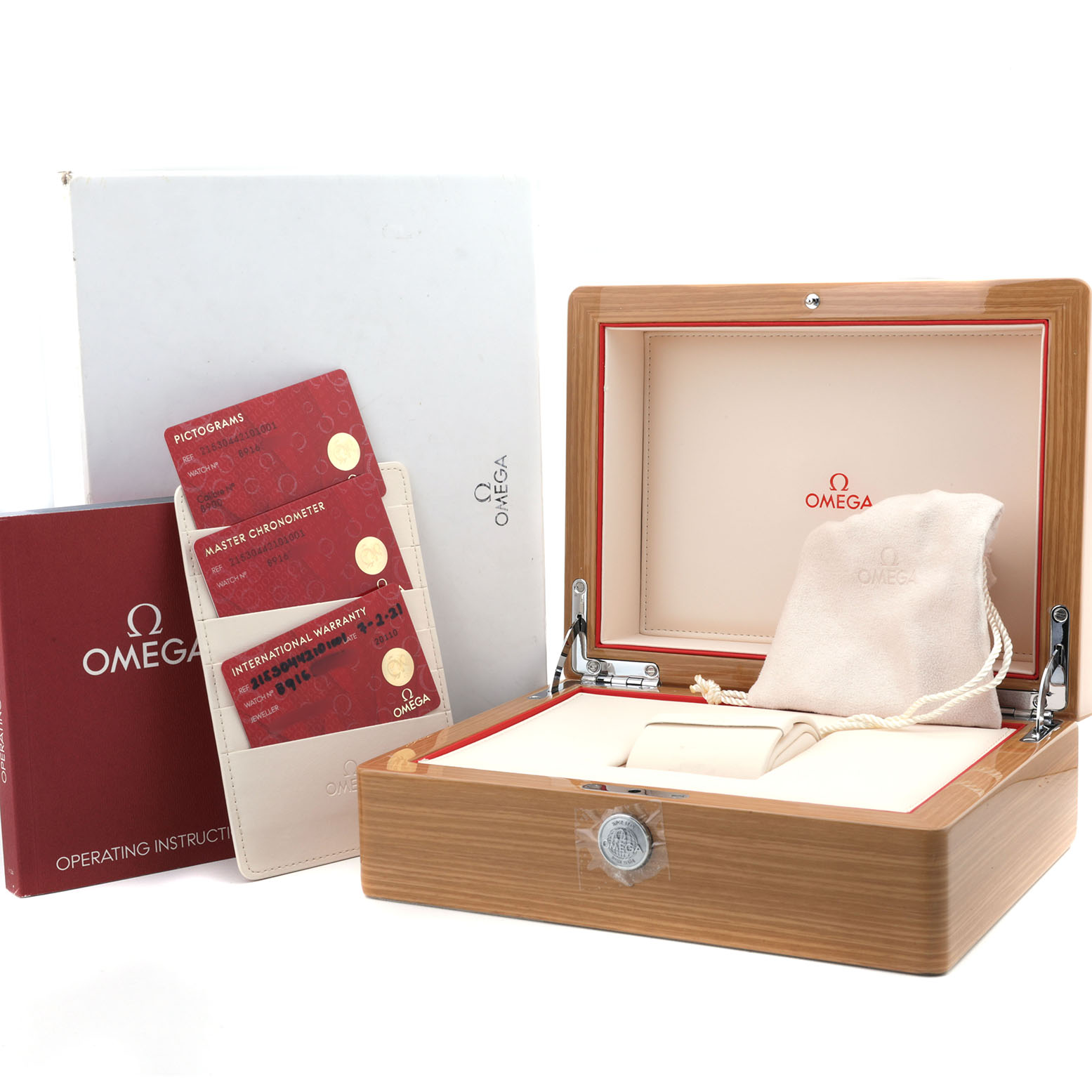 The image shows the packaging and accessories of an Omega Seamaster 215.32.44.21.01.001 Men's Stainless Steel Black Dial, including cards and a box, with no watch visible.
