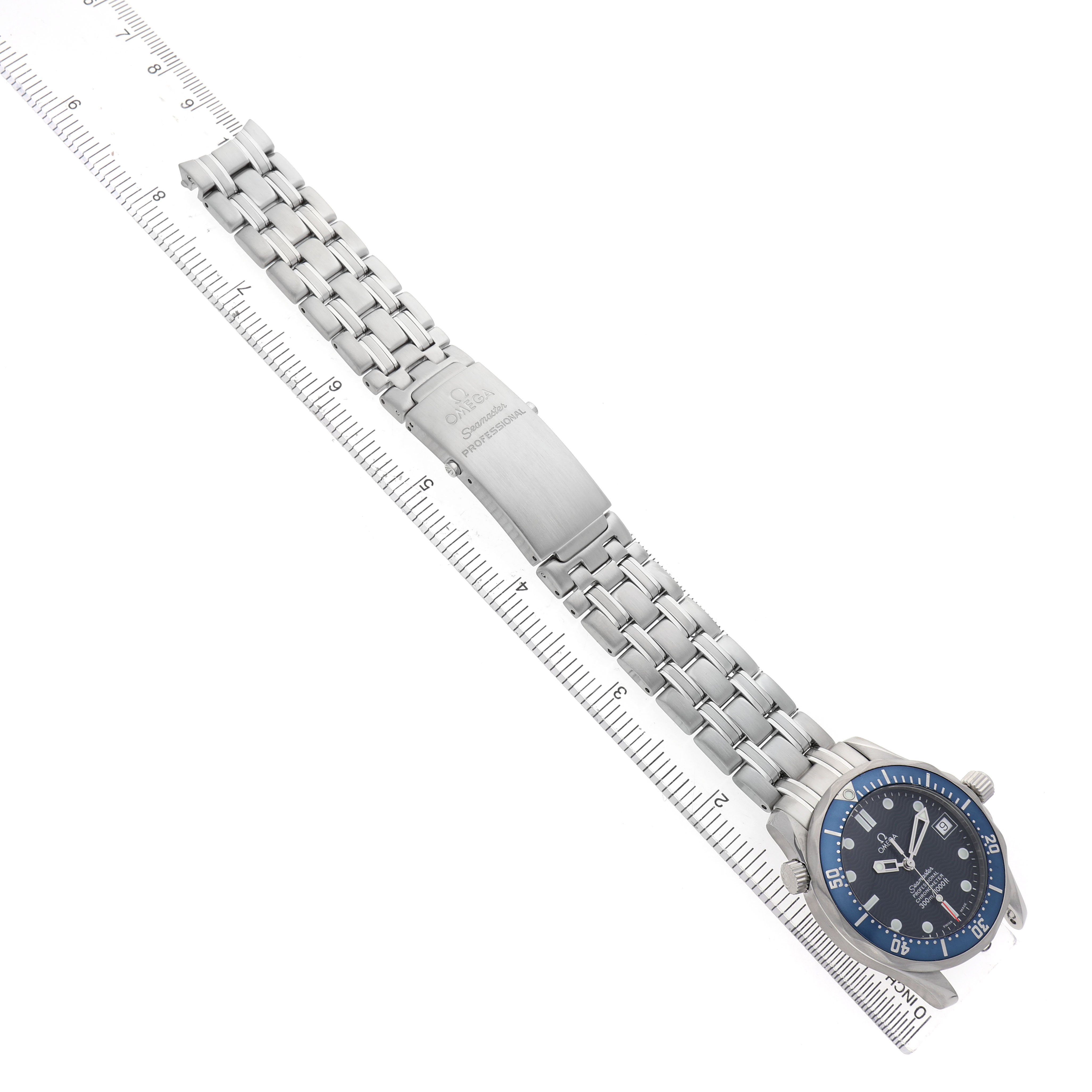 The Omega Seamaster 2551.80.00 Men's Stainless Steel Blue Dial watch is shown from a side angle, highlighting the metal bracelet and clasp with the watch face slightly rotated.