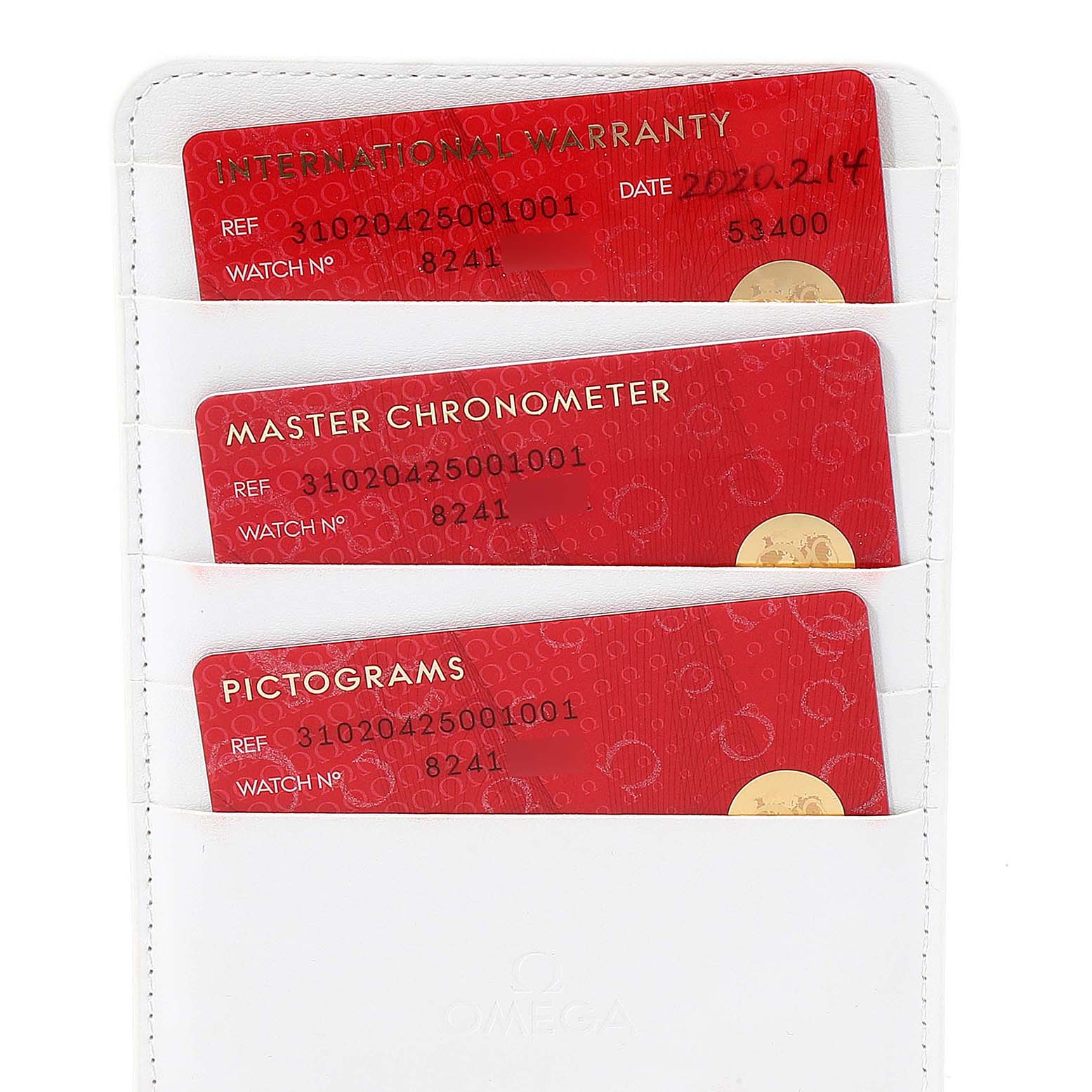 This image shows three red cards for an Omega Speedmaster 310.20.42.50.01.001 Men's Stainless Steel Grey Dial 310.20.42.50.01.001 Men's Stainless Steel Grey Dial: International Warranty, Master Chronometer, and Pictograms.