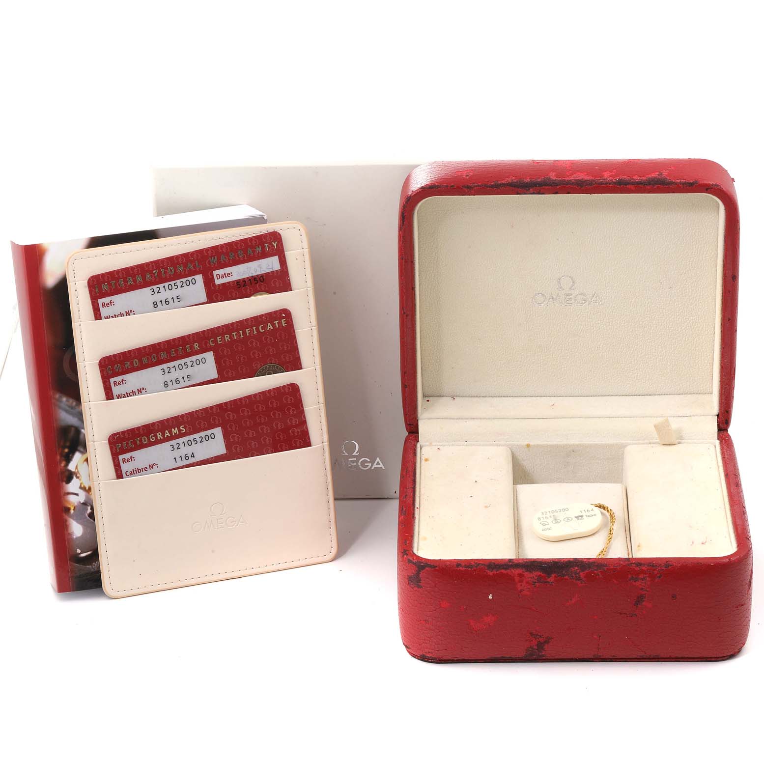 The image shows the Omega Speedmaster 3210.52.00 Men
s Stainless Steel Black Dial 3210.52.00 Men
s Stainless Steel Black Dial watch box, warranty cards, certificate holder, and a booklet.