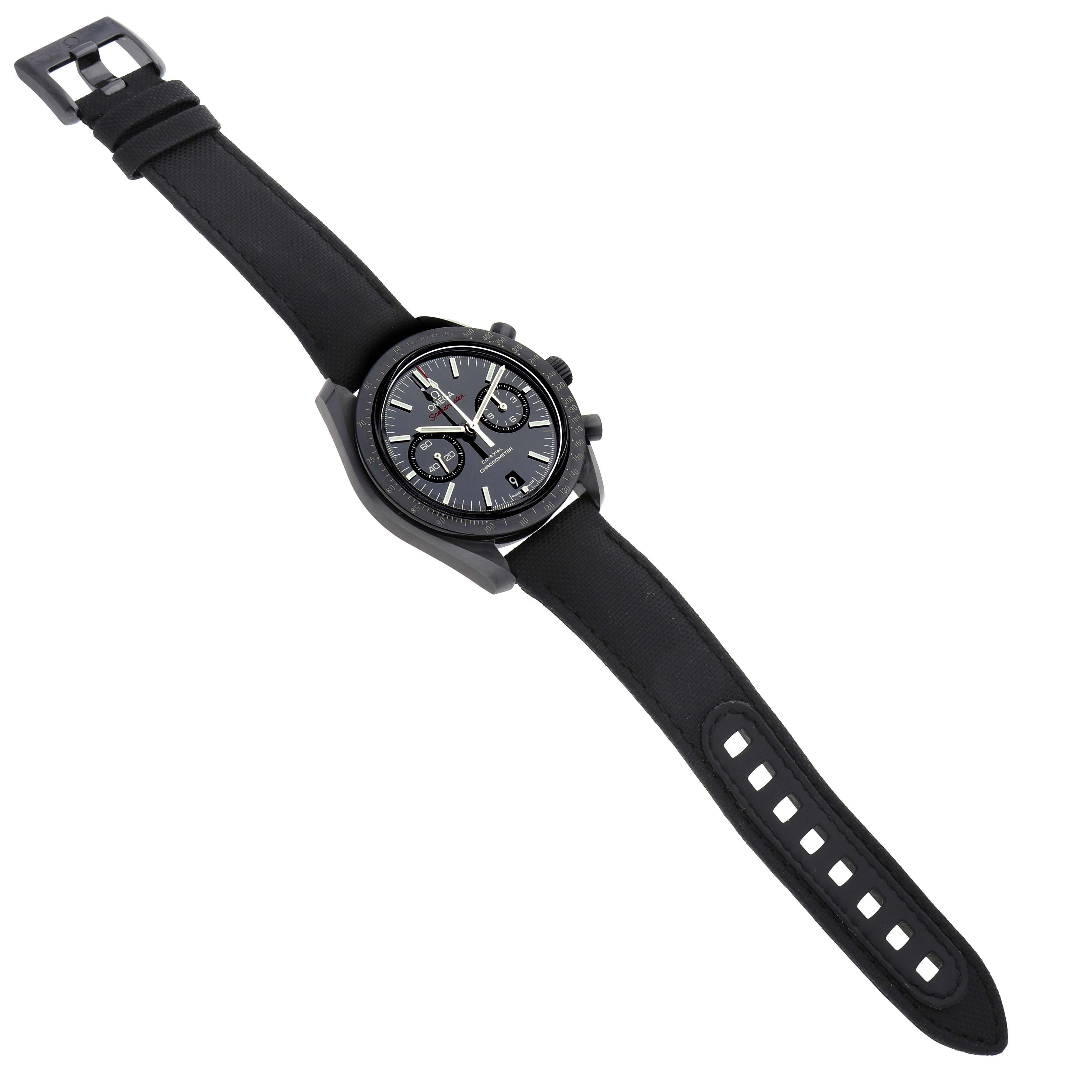 The Omega Speedmaster 311.92.44.51.01.003 Men
s Ceramic Black Dial is shown from a top-down angle, displaying the watch face, bezel, and strap with a visible buckle.