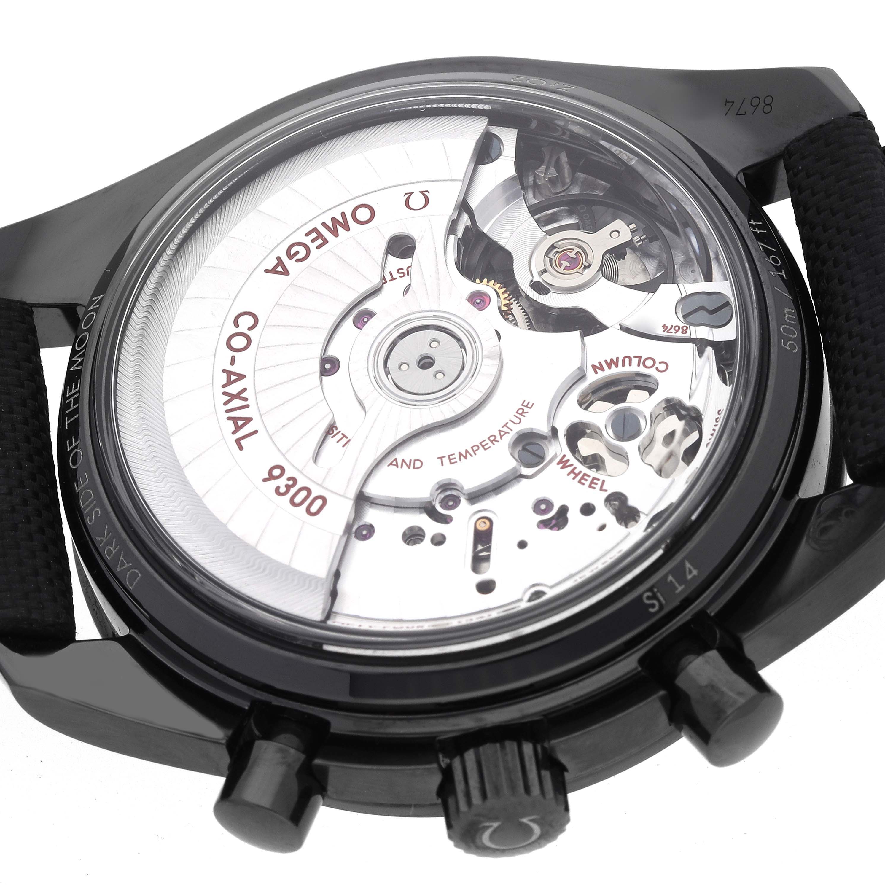 The image shows the back view of an Omega Speedmaster 311.92.44.51.01.003 Men
s Ceramic Black Dial, displaying the Co-Axial 9300 movement and inner mechanisms.