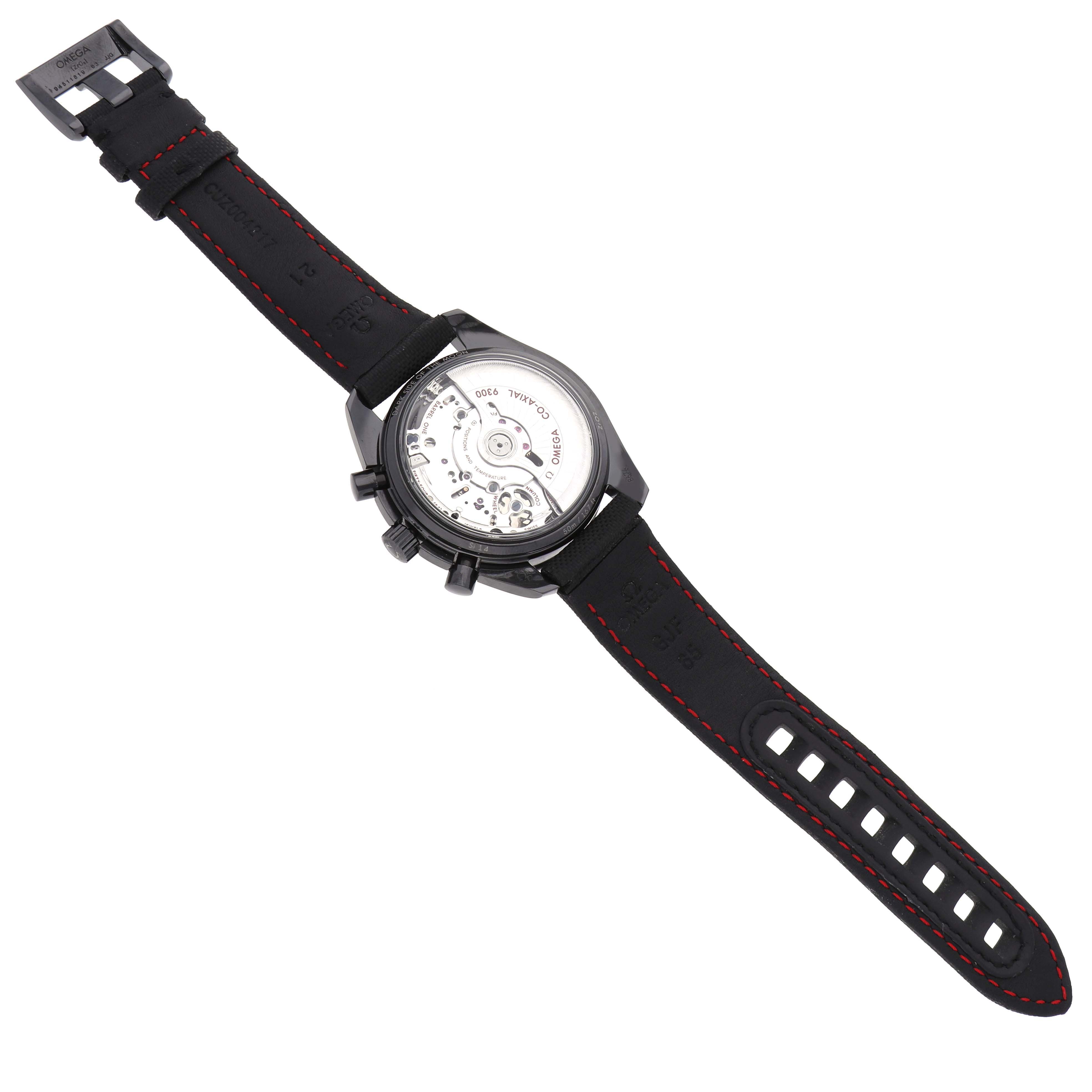 The Omega Speedmaster 311.92.44.51.01.003 Men
s Ceramic Black Dial watch is shown from the back, displaying its transparent case back and inner movement, with a black strap.