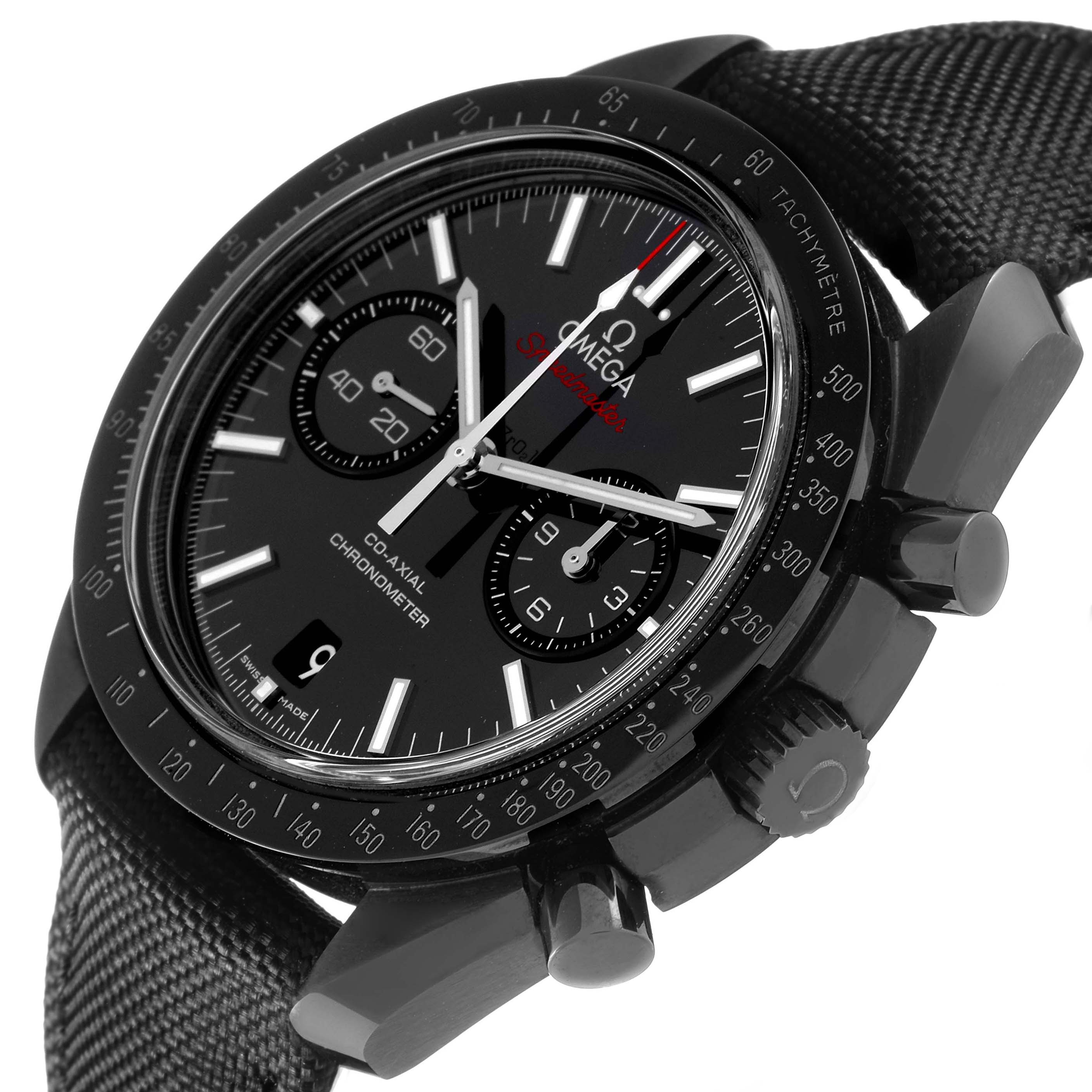 The Omega Speedmaster 311.92.44.51.01.003 Men
s Ceramic Black Dial watch is shown at an angle highlighting the face, buttons, and textured strap.
