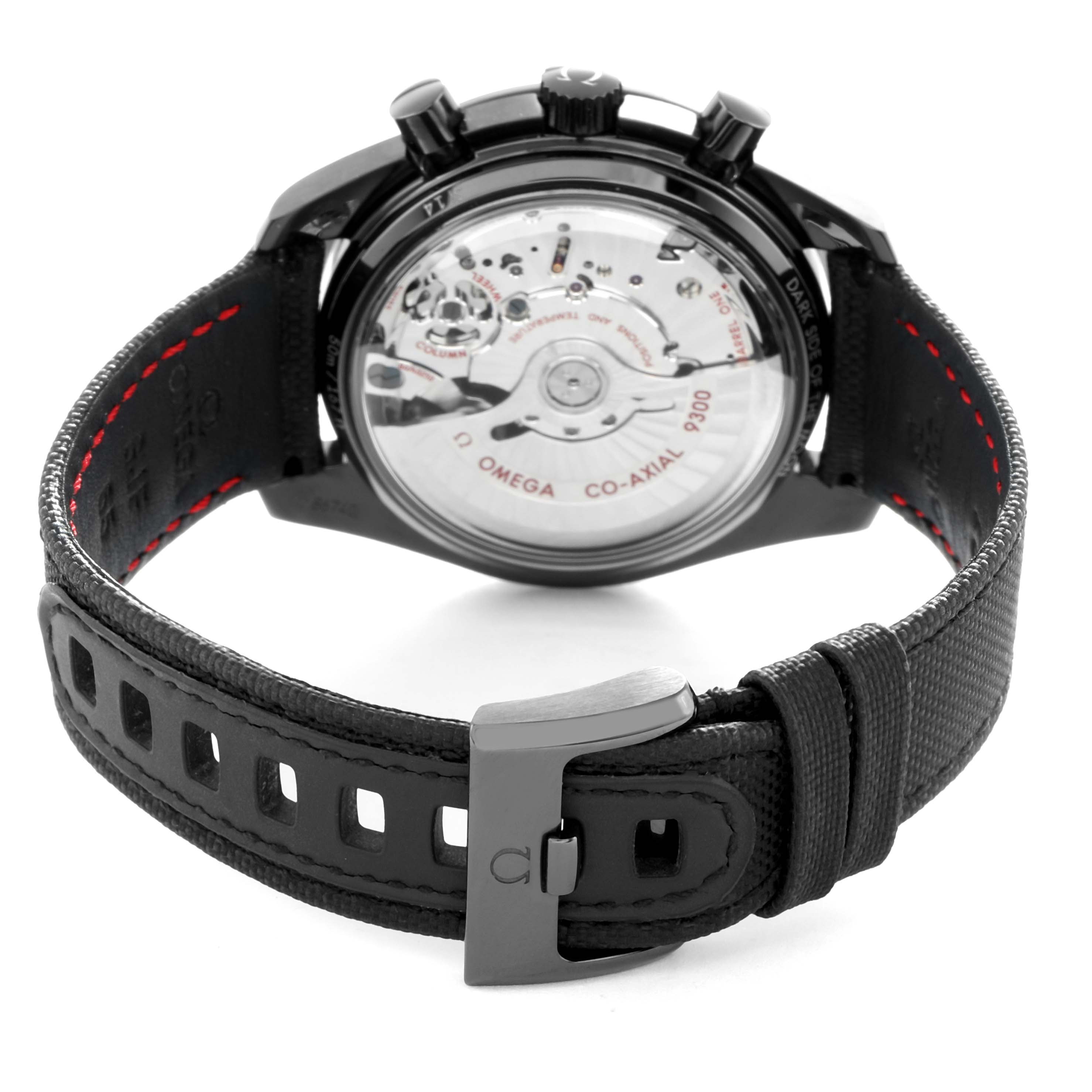 The image shows the back of the Omega Speedmaster 311.92.44.51.01.003 Men
s Ceramic Black Dial, highlighting the Co-Axial movement and black leather strap.