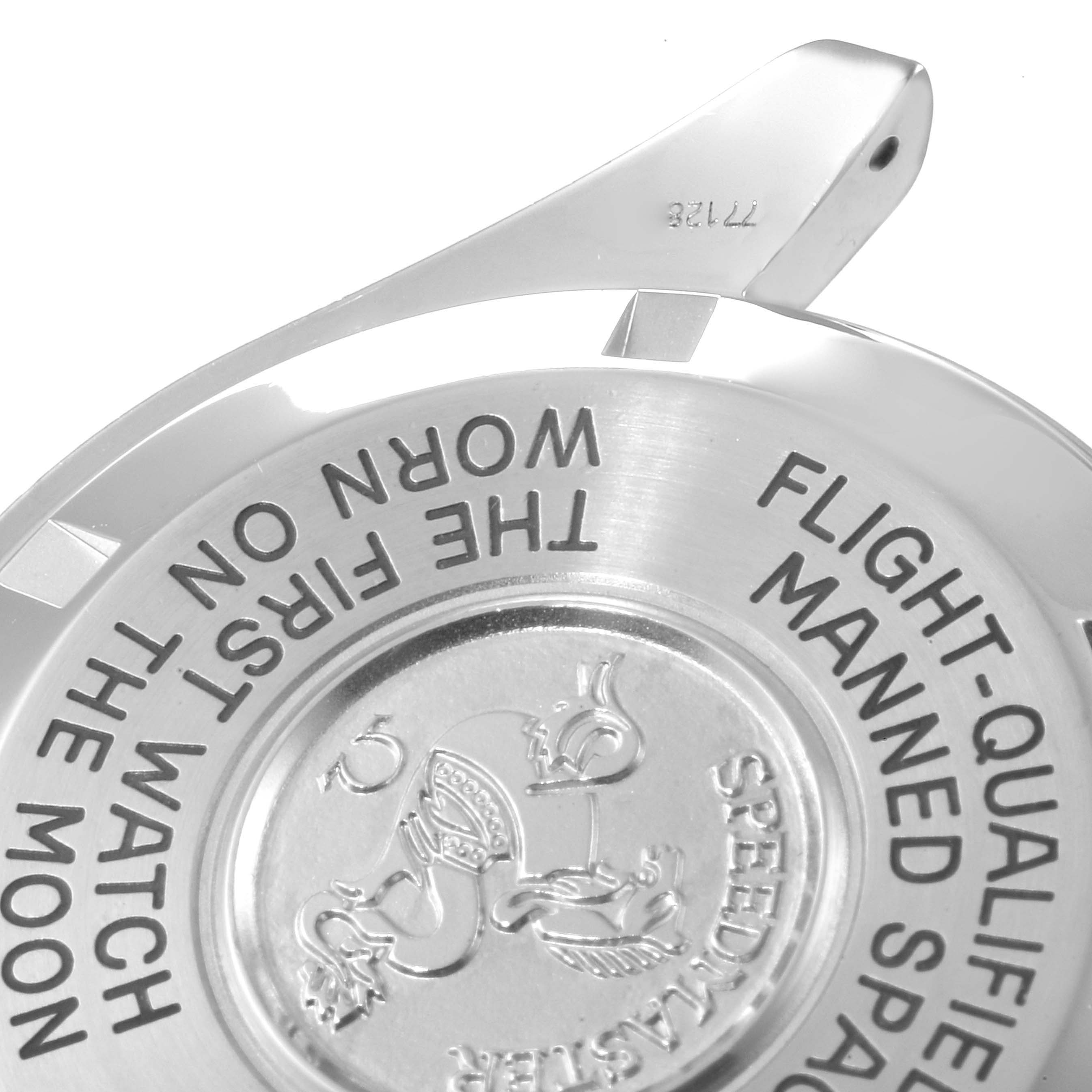 The image shows the back case of an Omega Speedmaster 3570.40.00 Men's Stainless Steel Grey Dial 3570.40.00 Men's Stainless Steel Grey Dial watch with engraved inscriptions and the Omega logo.