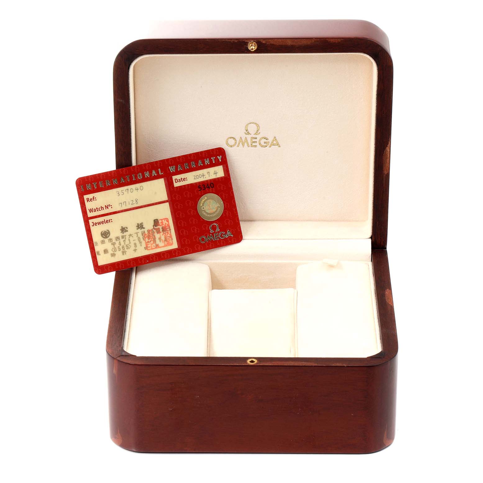 The image shows an Omega Speedmaster 3570.40.00 Men's Stainless Steel Grey Dial 3570.40.00 Men's Stainless Steel Grey Dial watch box with an international warranty card angled inside it.