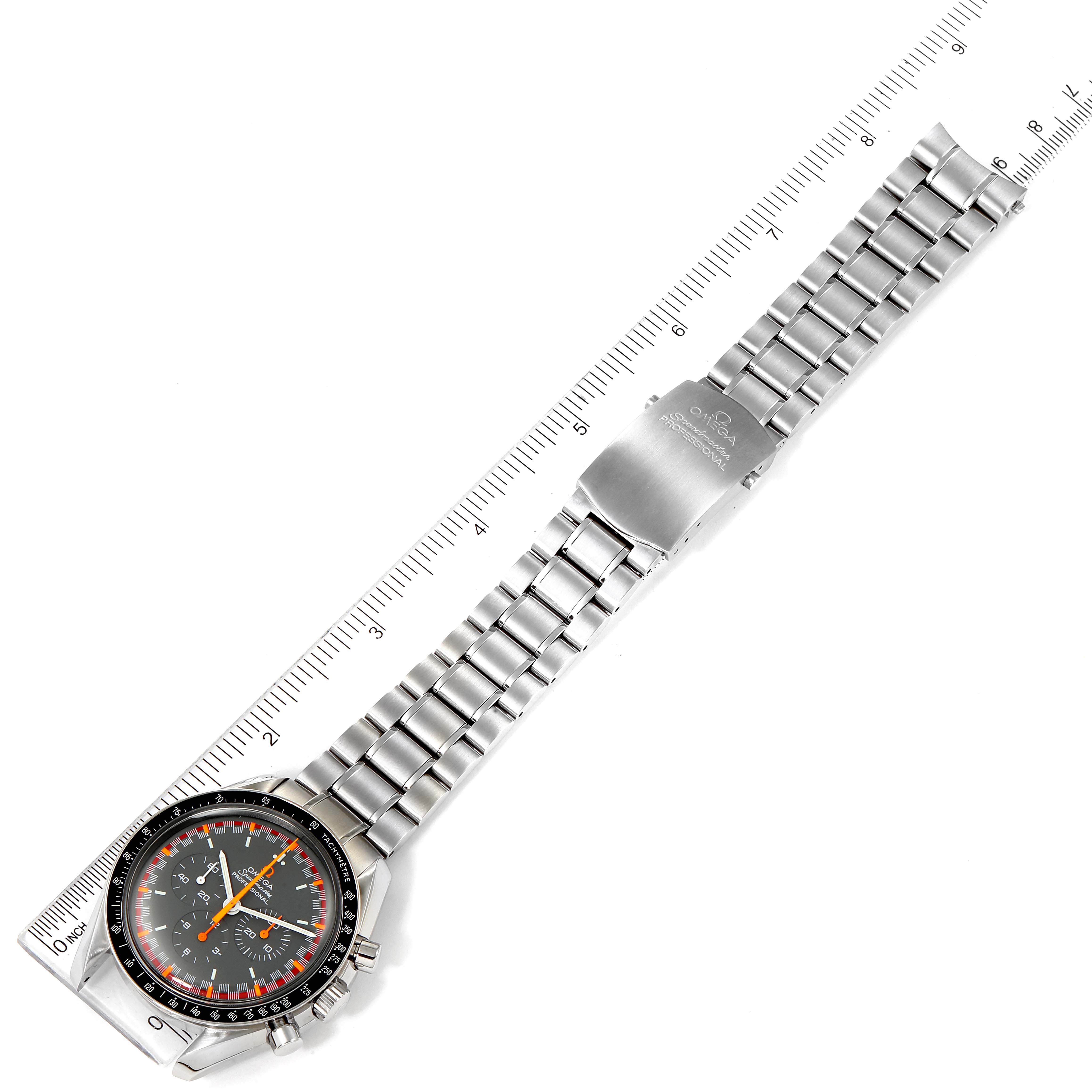 The image shows an overhead view of an Omega Speedmaster 3570.40.00 Men's Stainless Steel Grey Dial 3570.40.00 Men's Stainless Steel Grey Dial watch, including the face, stainless steel bracelet, and clasp.