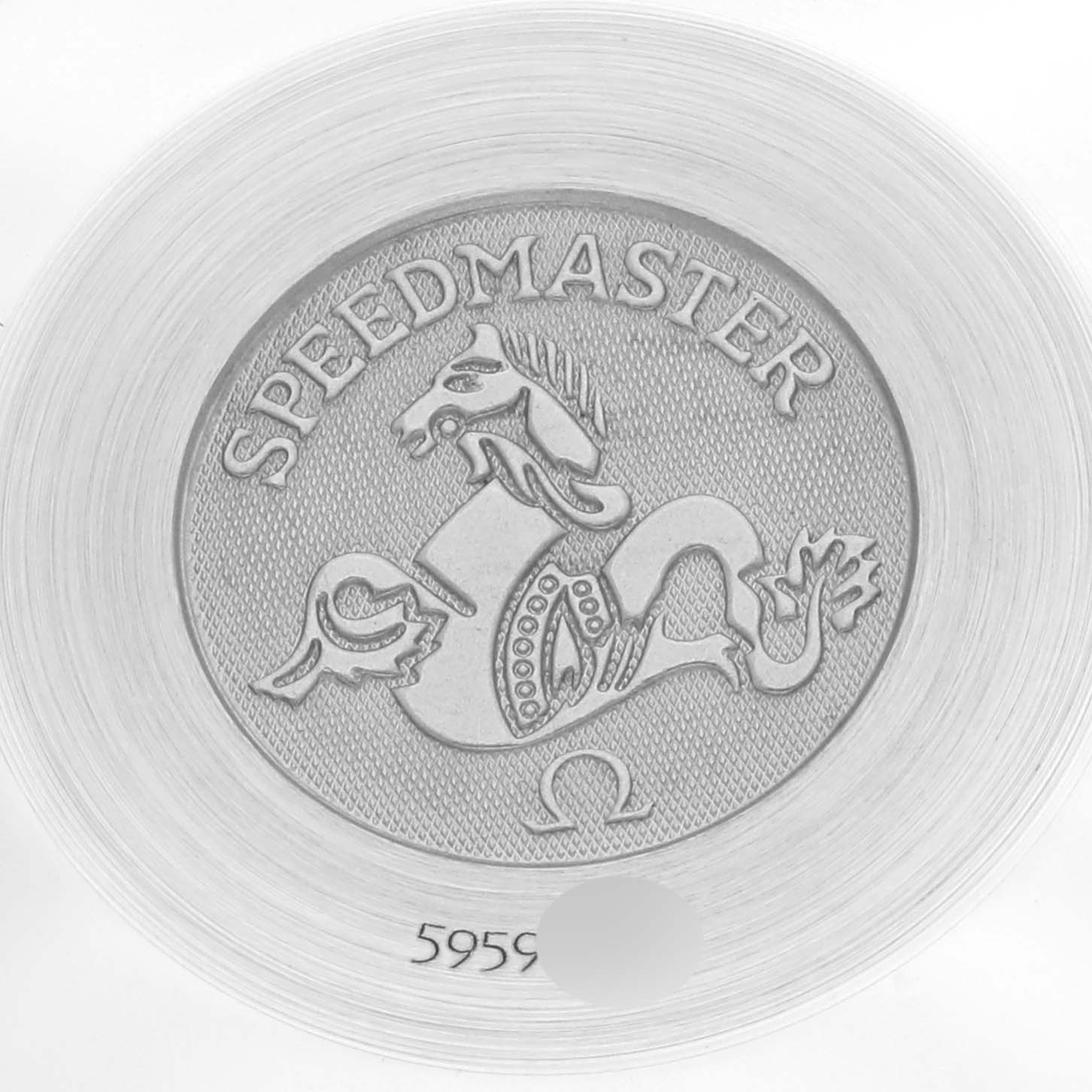 The image shows the case back of an Omega Speedmaster 3534.74.00 Men's Stainless Steel Mother of Pearl Dial 3534.74.00 Men's Stainless Steel Mother of Pearl Dial with the brand emblem and engraving.