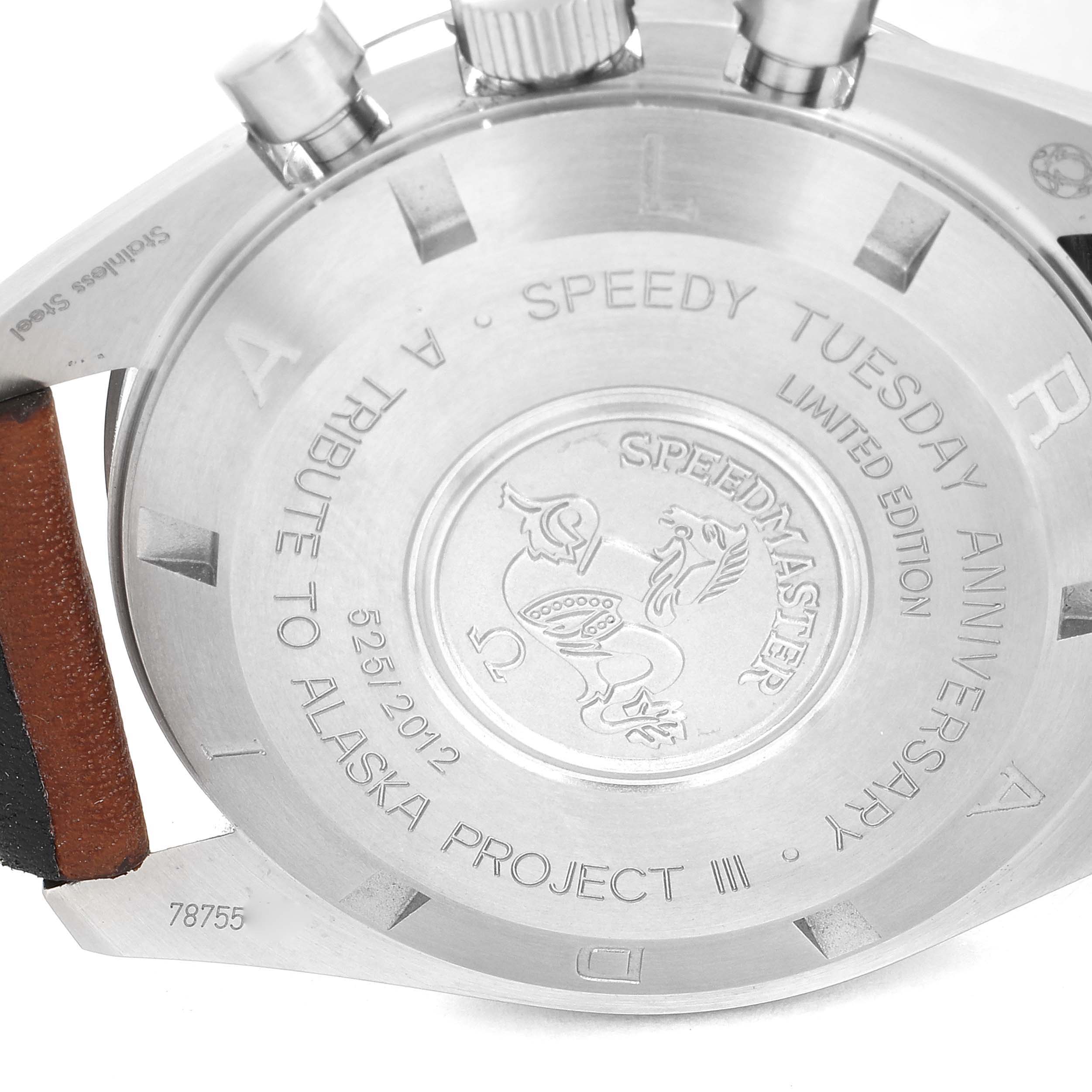 This image shows the back case of an Omega Speedmaster 311.32.42.30.01.001 Men's Steel and Gold (two tone)  311.32.42.30.01.001 Men's Steel and Gold (two tone)  watch, including the inscriptions and pushers at an angle.