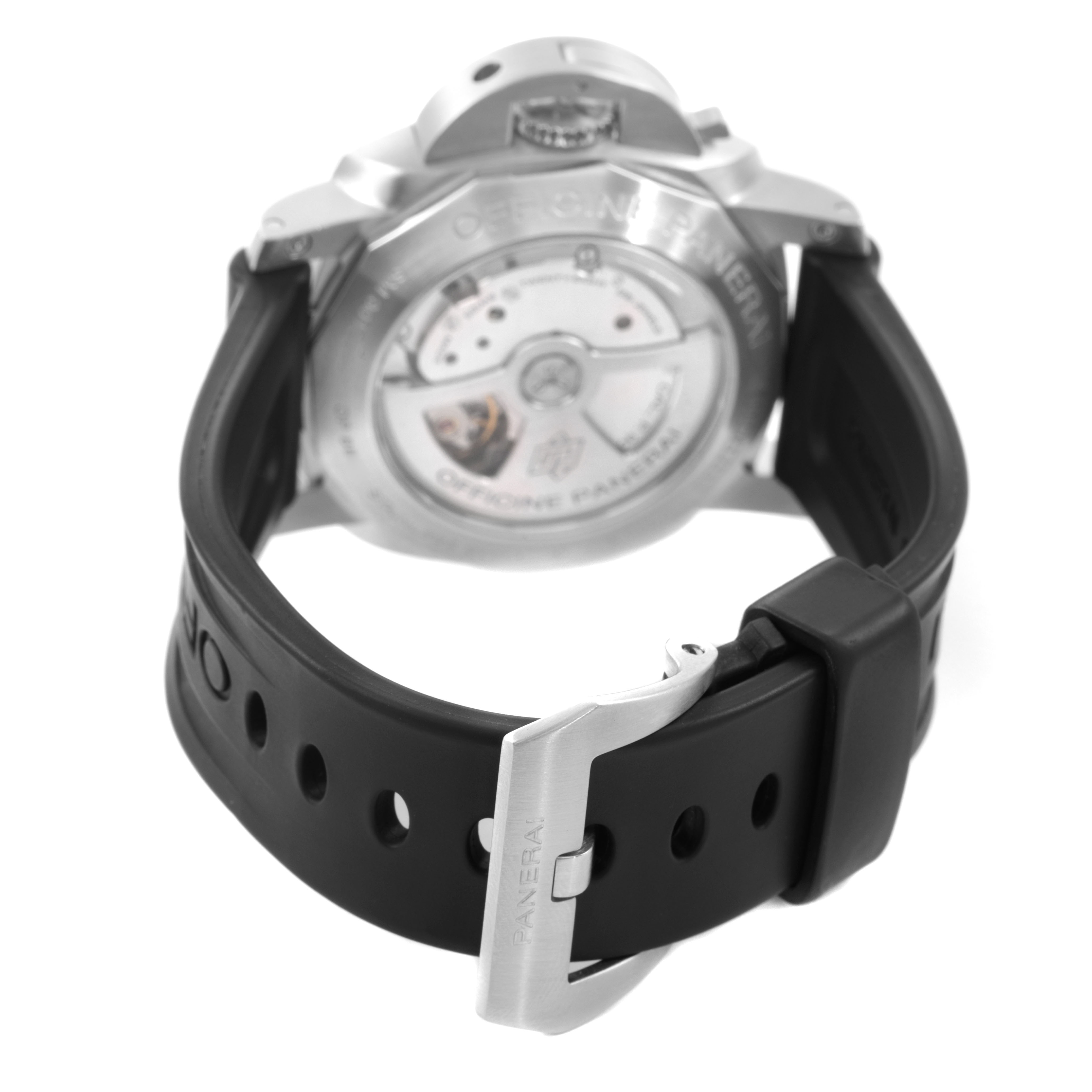 The image shows the back view of a Panerai Luminor PAM00312 Men's Stainless Steel Black Dial model watch, highlighting its case back and rubber strap with a metal clasp.