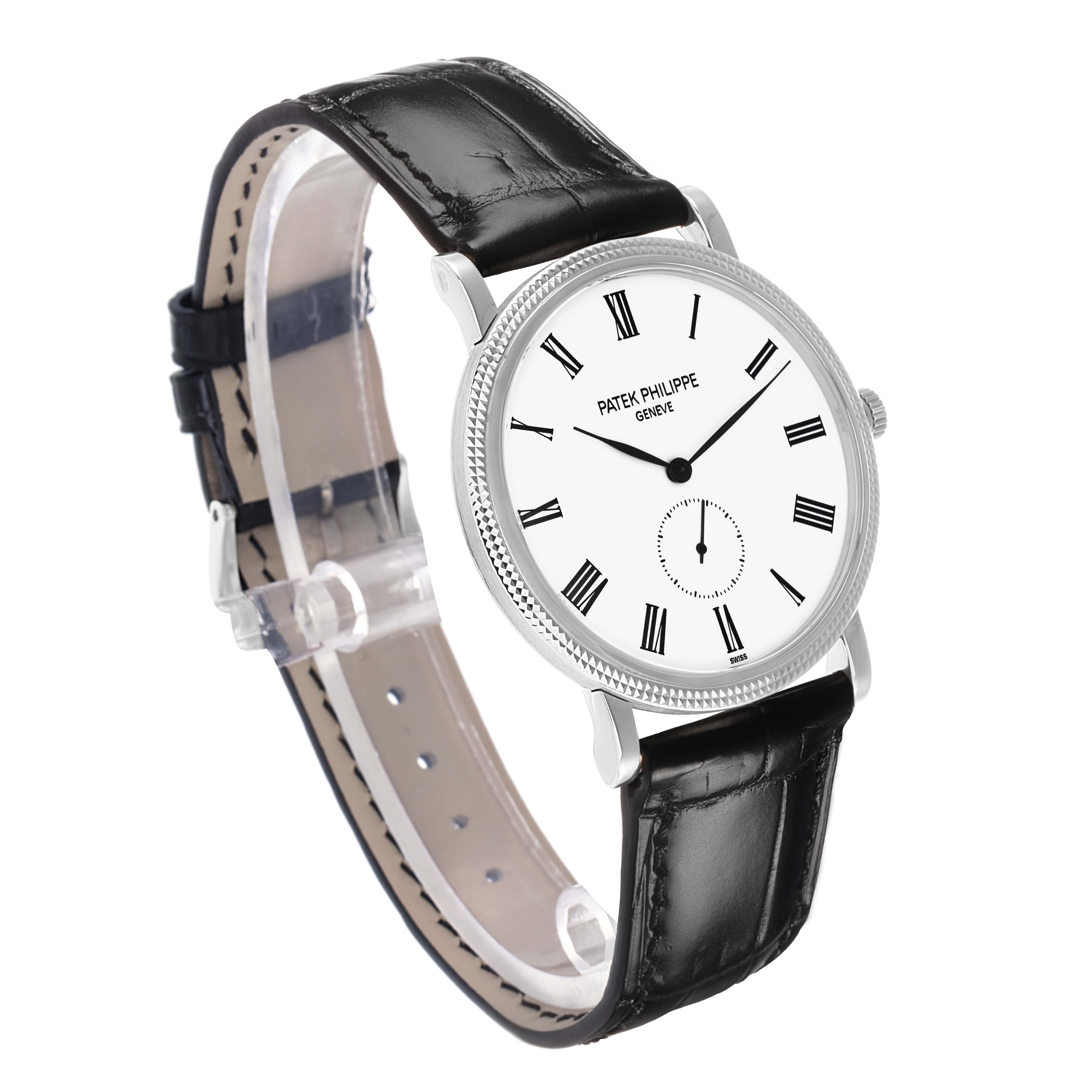 The Patek Philippe Calatrava 5119G Men
s White Gold White Dial watch is shown at a slight angle, highlighting the face, case, and leather strap.