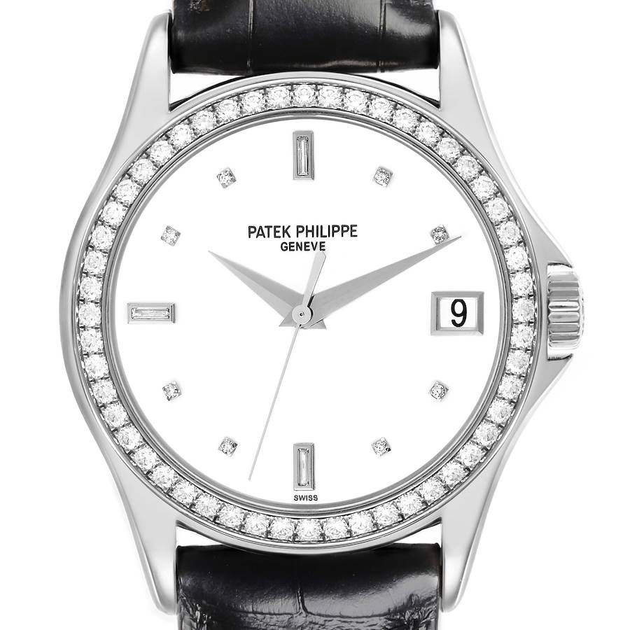 The Patek Philippe Calatrava watch is shown from the front, highlighting the dial, bezel, and part of the strap.