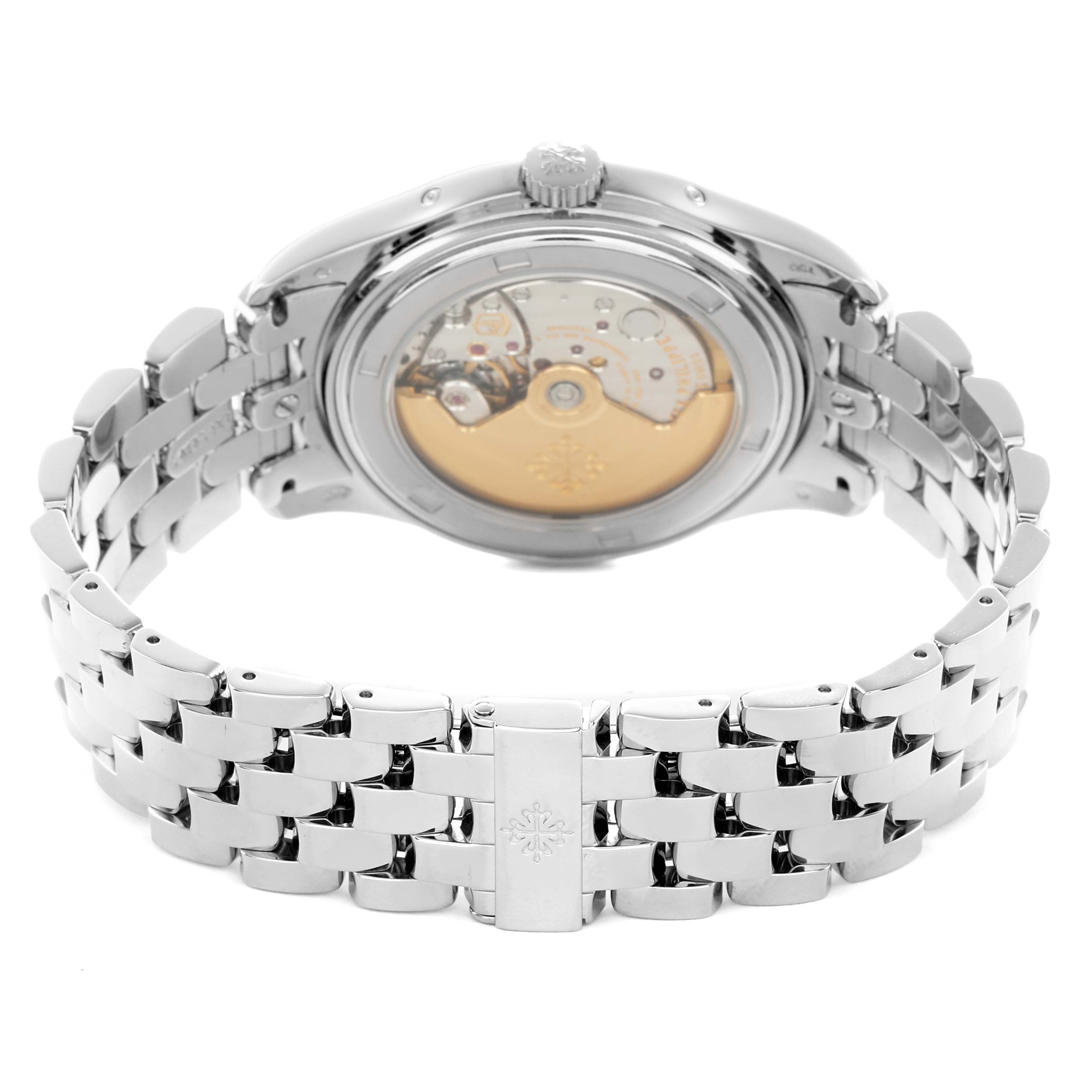 The image shows the back view of a Patek Philippe Complications 5146G Men
s White Gold White Dial watch, highlighting its transparent case back and metal bracelet.