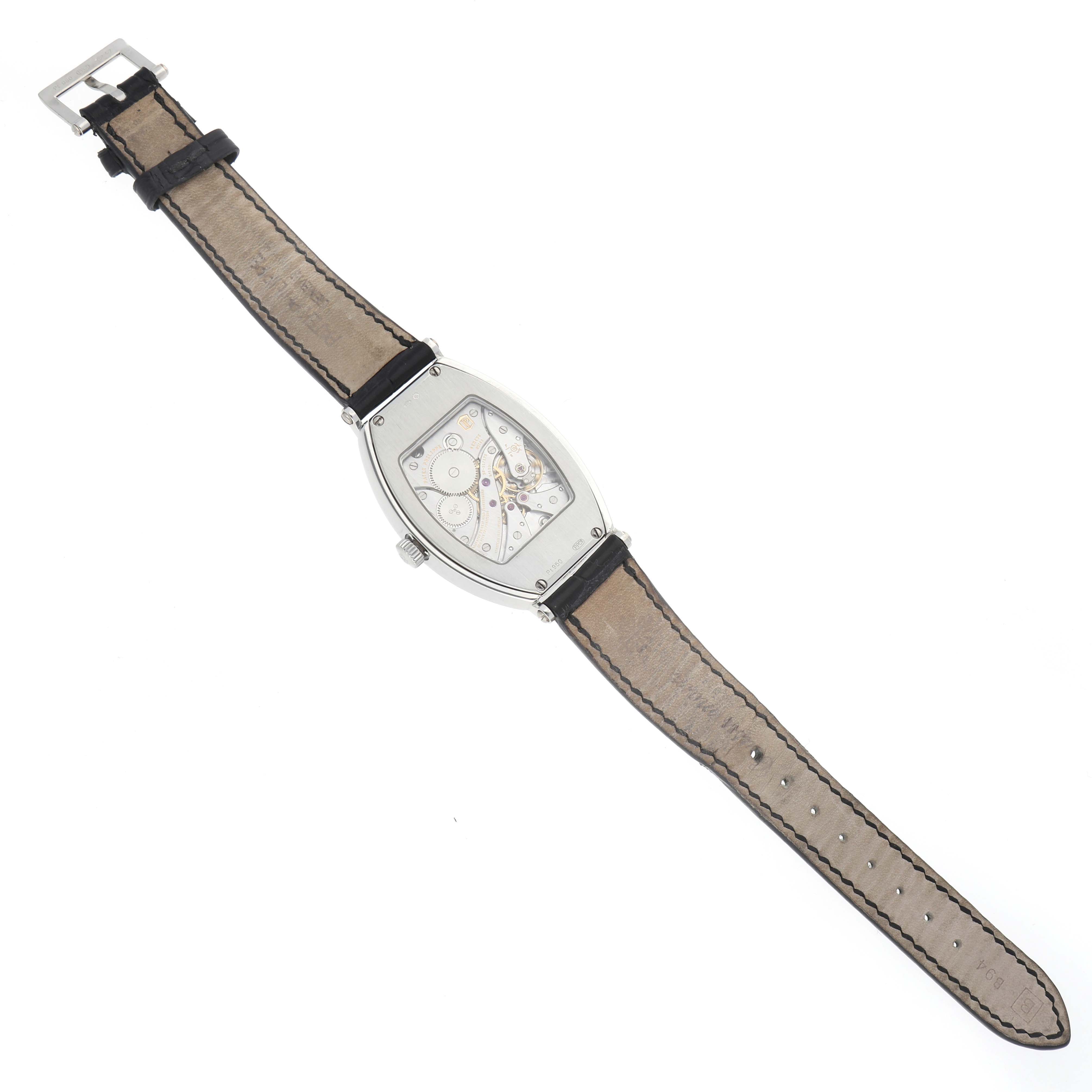 The image shows the back view of a Patek Philippe Gondolo 5098P Men
s Platinum Silver Dial watch, highlighting the movement and leather strap.