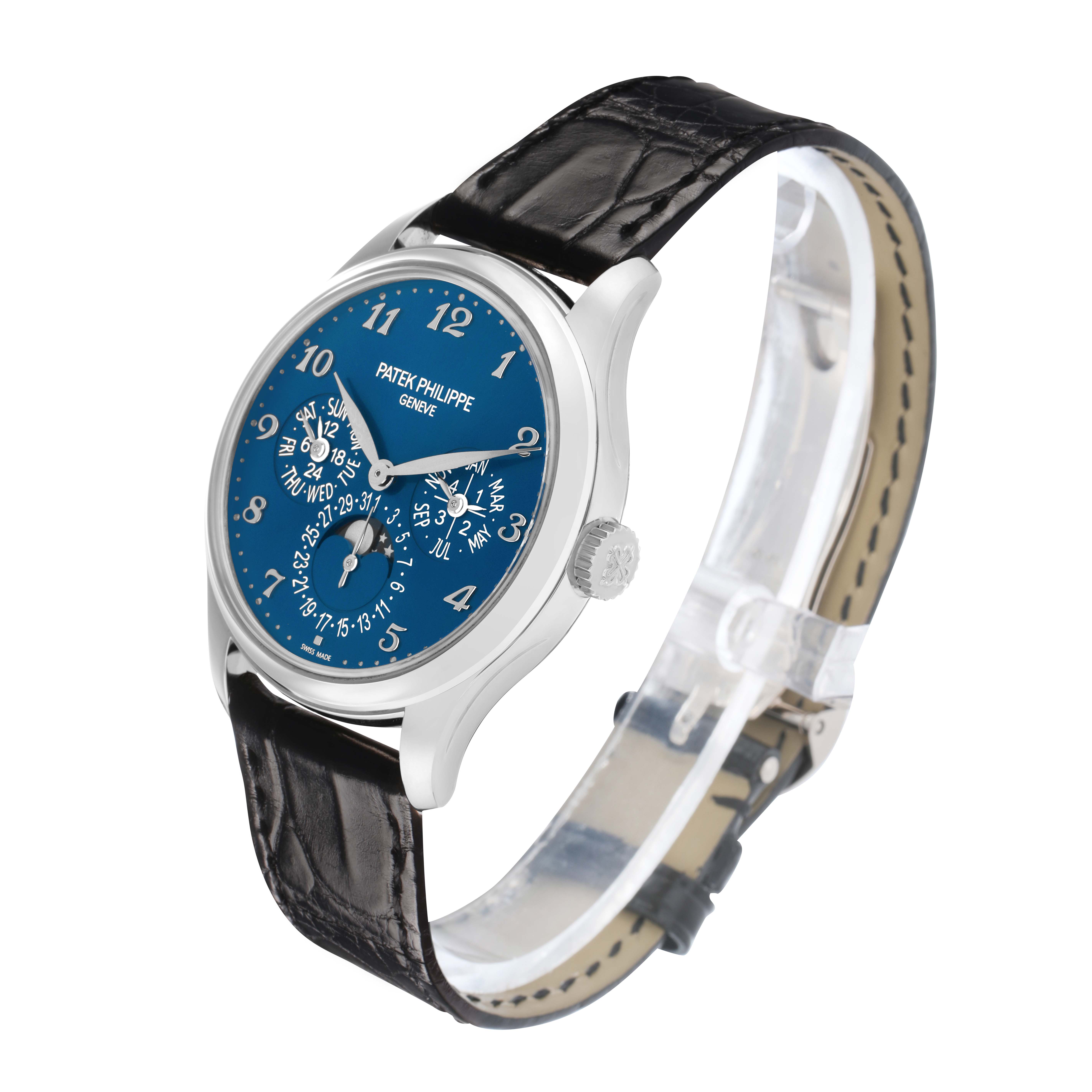 The Patek Philippe Complications 5327G Men
s White Gold Blue Dial watch is shown at a three-quarter angle, highlighting the blue dial, case, and strap.