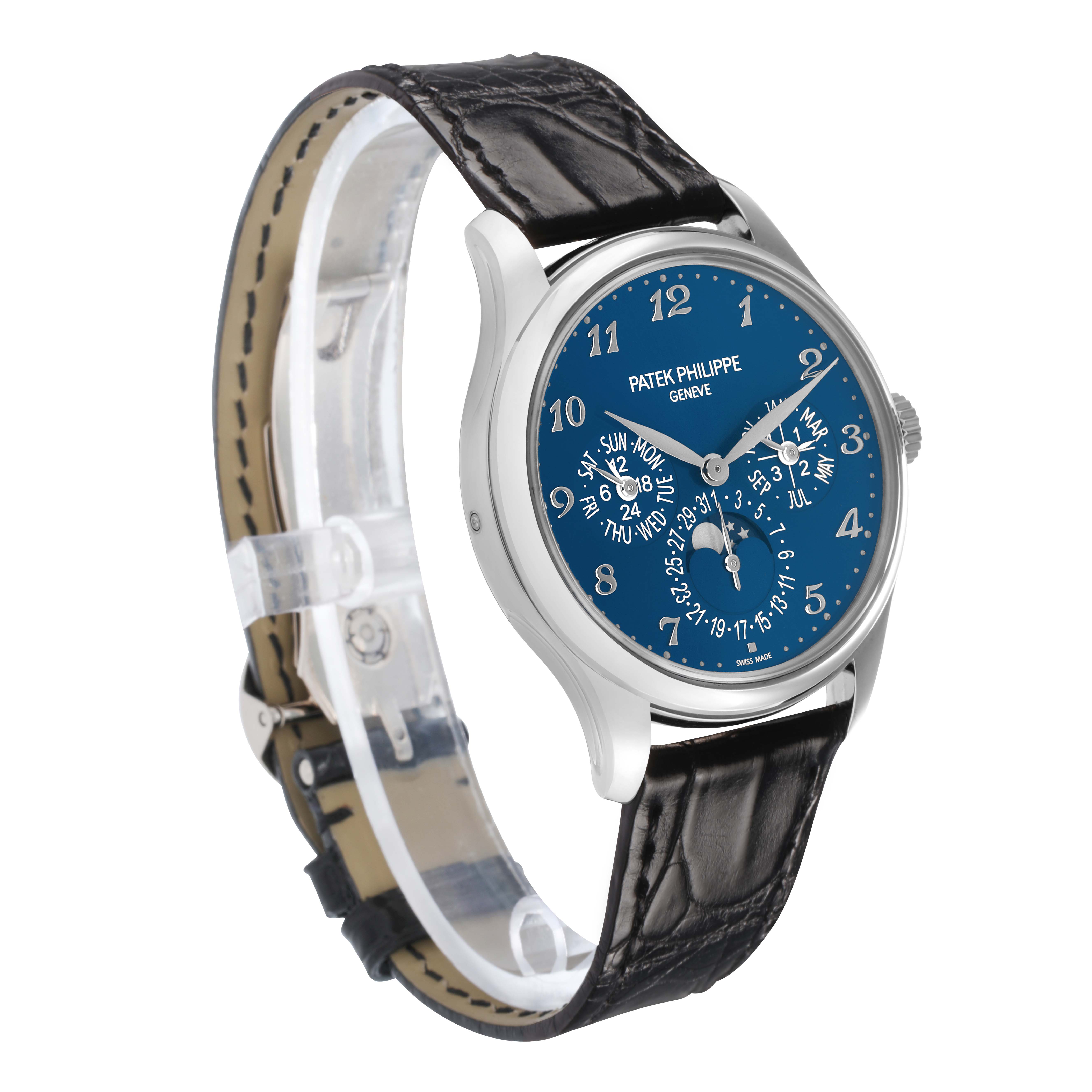 The Patek Philippe Complications 5327G Men
s White Gold Blue Dial watch is shown at an angled side view, highlighting its blue dial and leather strap.