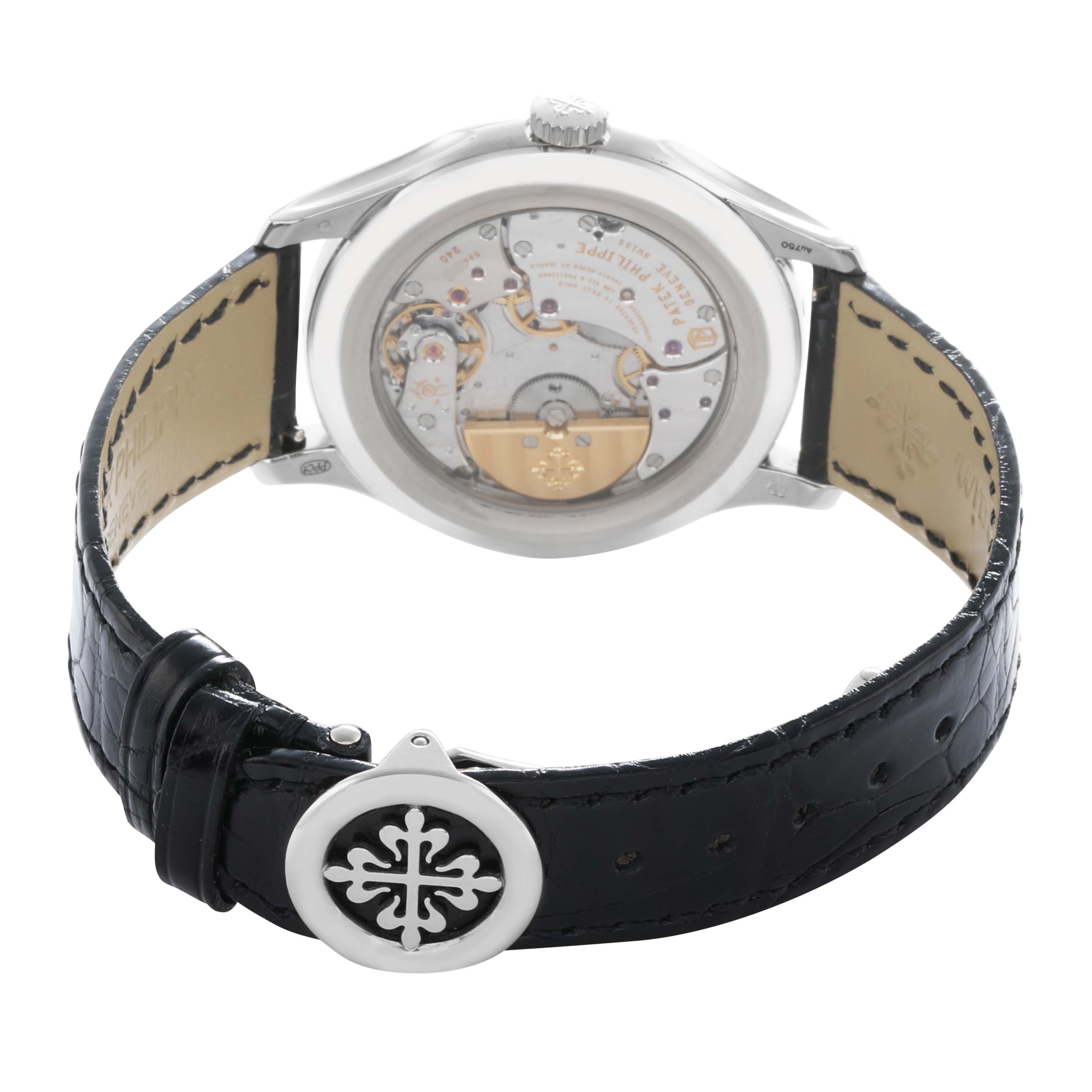 The Patek Philippe Complications 5327G Men
s White Gold Blue Dial watch is shown from the back, highlighting the movement and leather strap with the clasp closed.