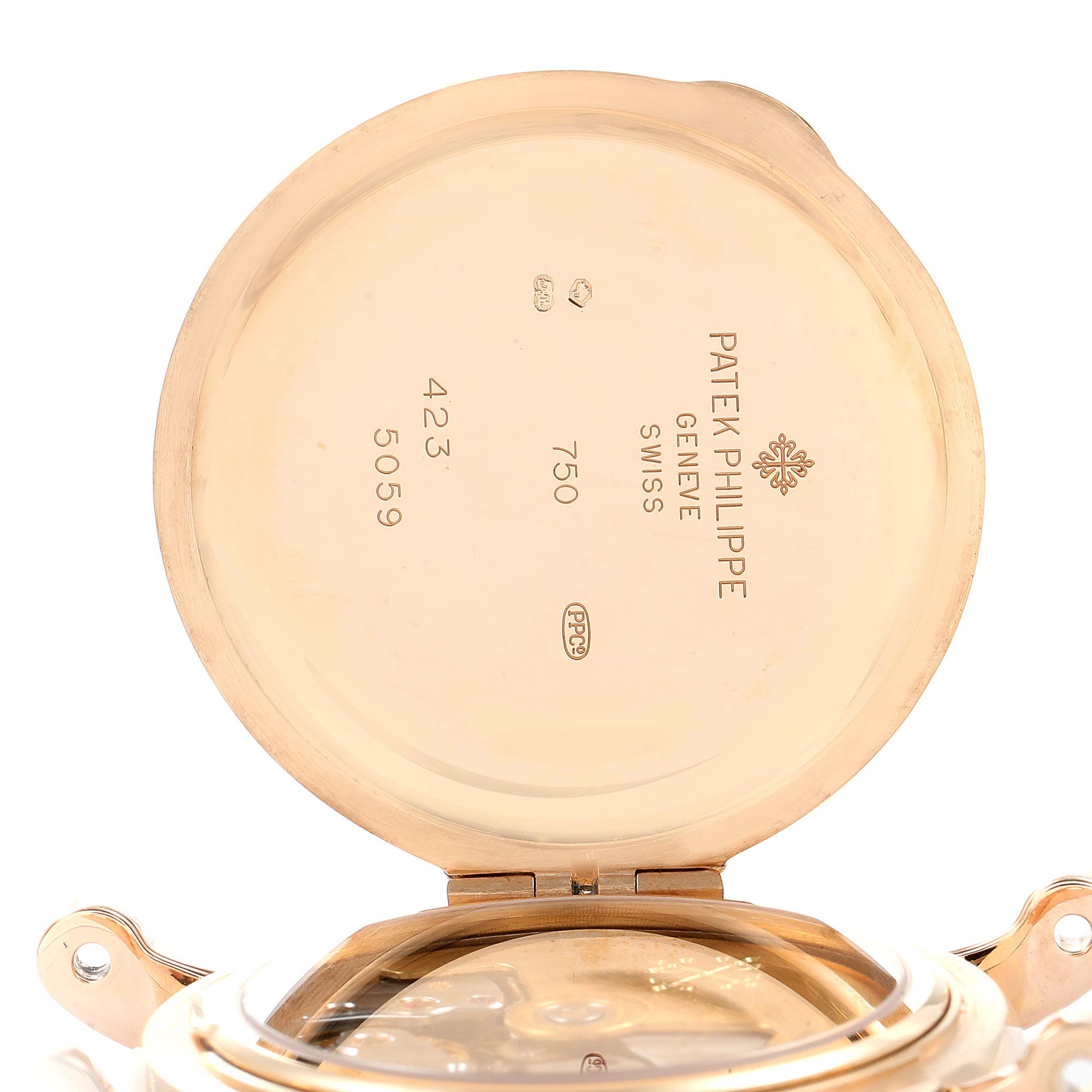The image shows the open back cover of a Patek Philippe Complications 5059R Men
s Rose Gold White Dial 5059R Men
s Rose Gold White Dial watch, revealing the inner markings and part of the movement.