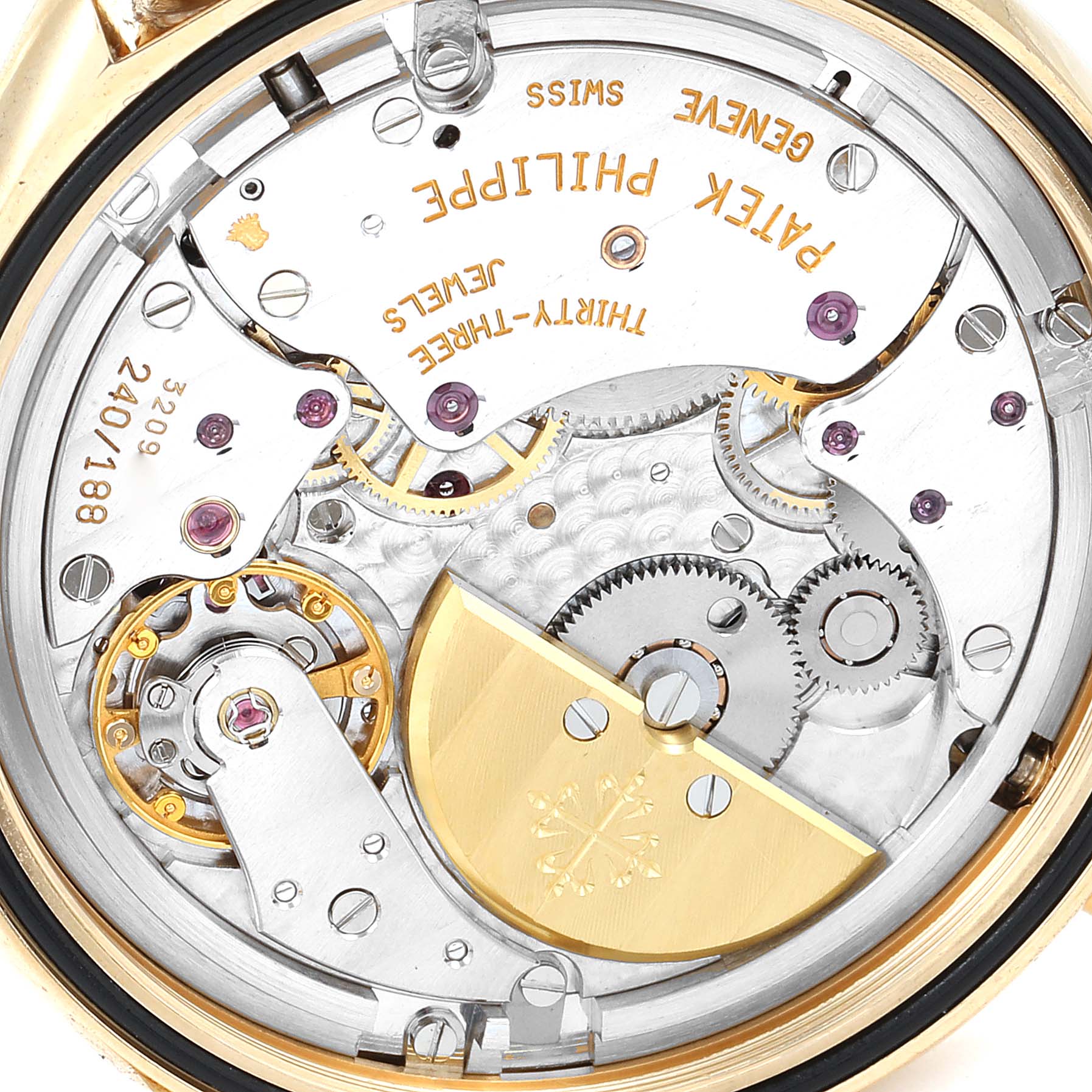 The image shows the movement mechanism of a Patek Philippe Complications 5110J Men's Yellow Gold Silver Dial 5110J Men's Yellow Gold Silver Dial watch from a close-up, rear angle.