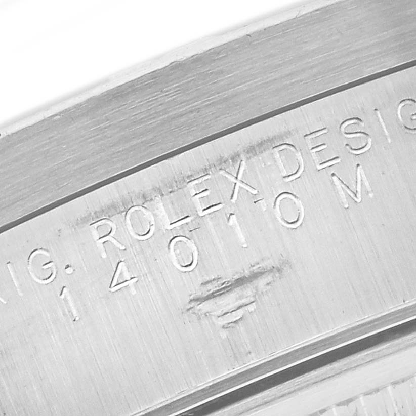 The image shows an engraved side view of the Rolex Air-King 14010M Men's Stainless Steel Pink Dial 14010M Men's Stainless Steel Pink Dial, displaying the model number and brand name.