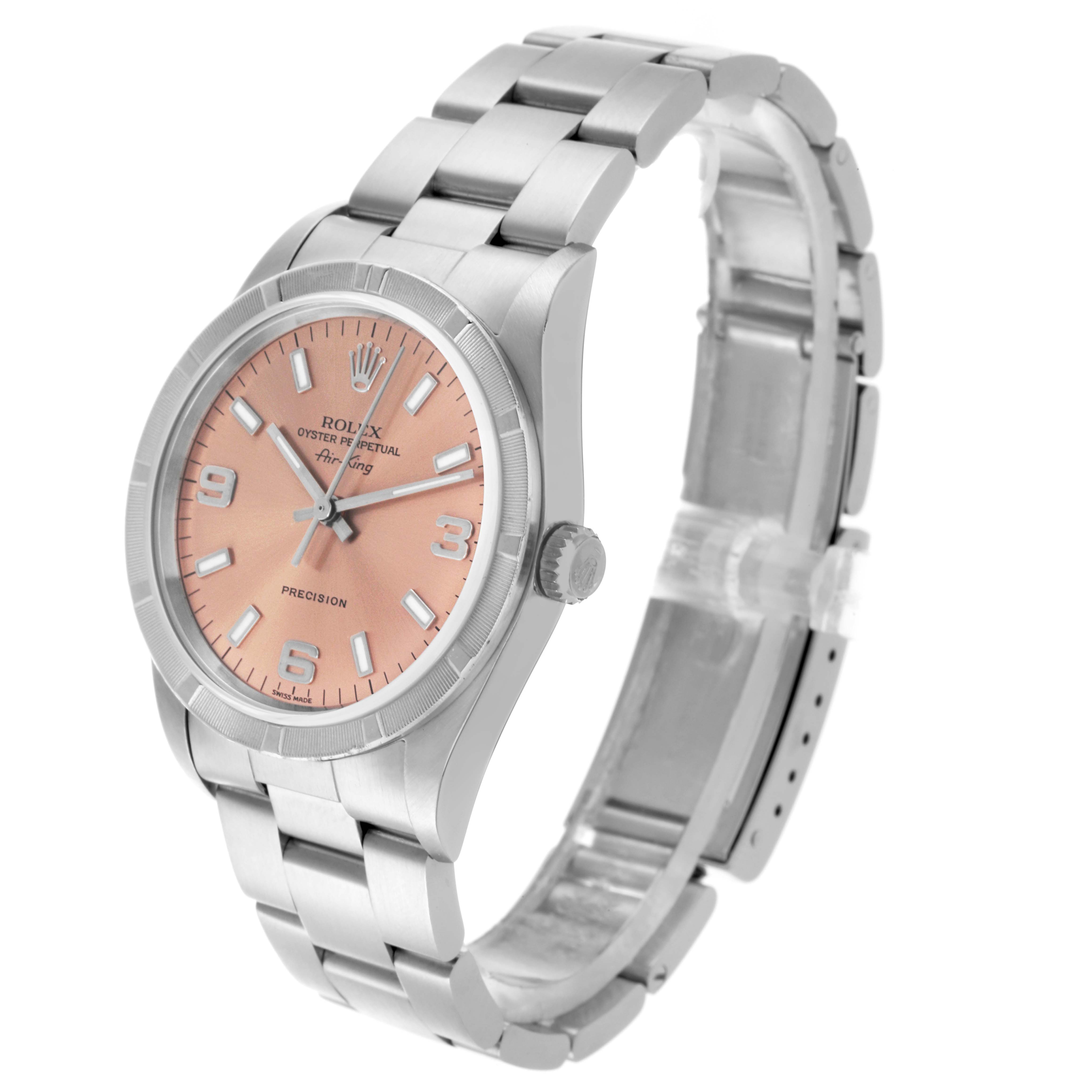 The Rolex Air-King 14010M Men's Stainless Steel Pink Dial 14010M Men's Stainless Steel Pink Dial watch is shown at a three-quarter angle, highlighting the dial, bezel, crown, and bracelet.
