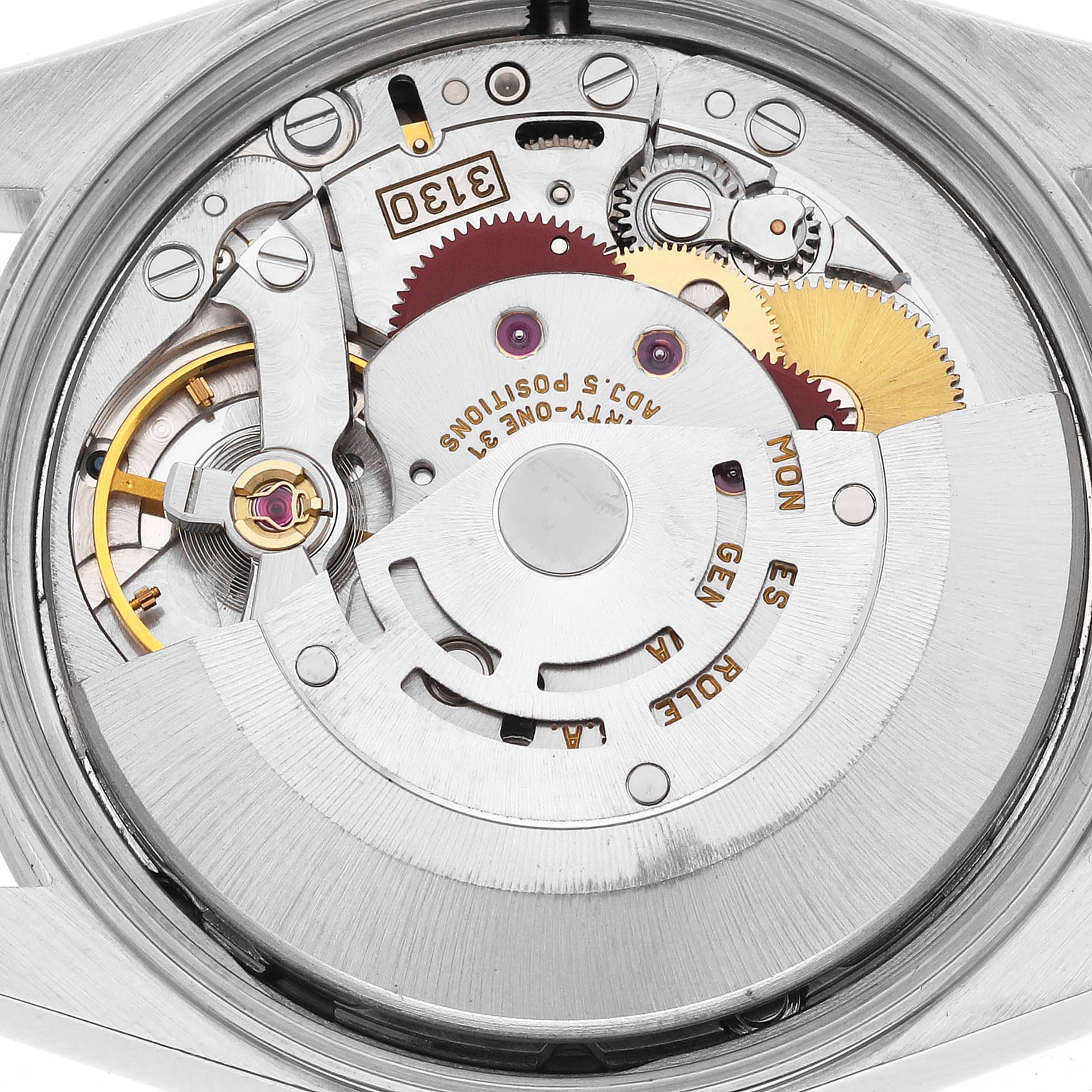 The image shows the movement assembly of a Rolex Air-King 14010M Men's Stainless Steel Pink Dial 14010M Men's Stainless Steel Pink Dial watch from a top-down angle, highlighting gears and components.