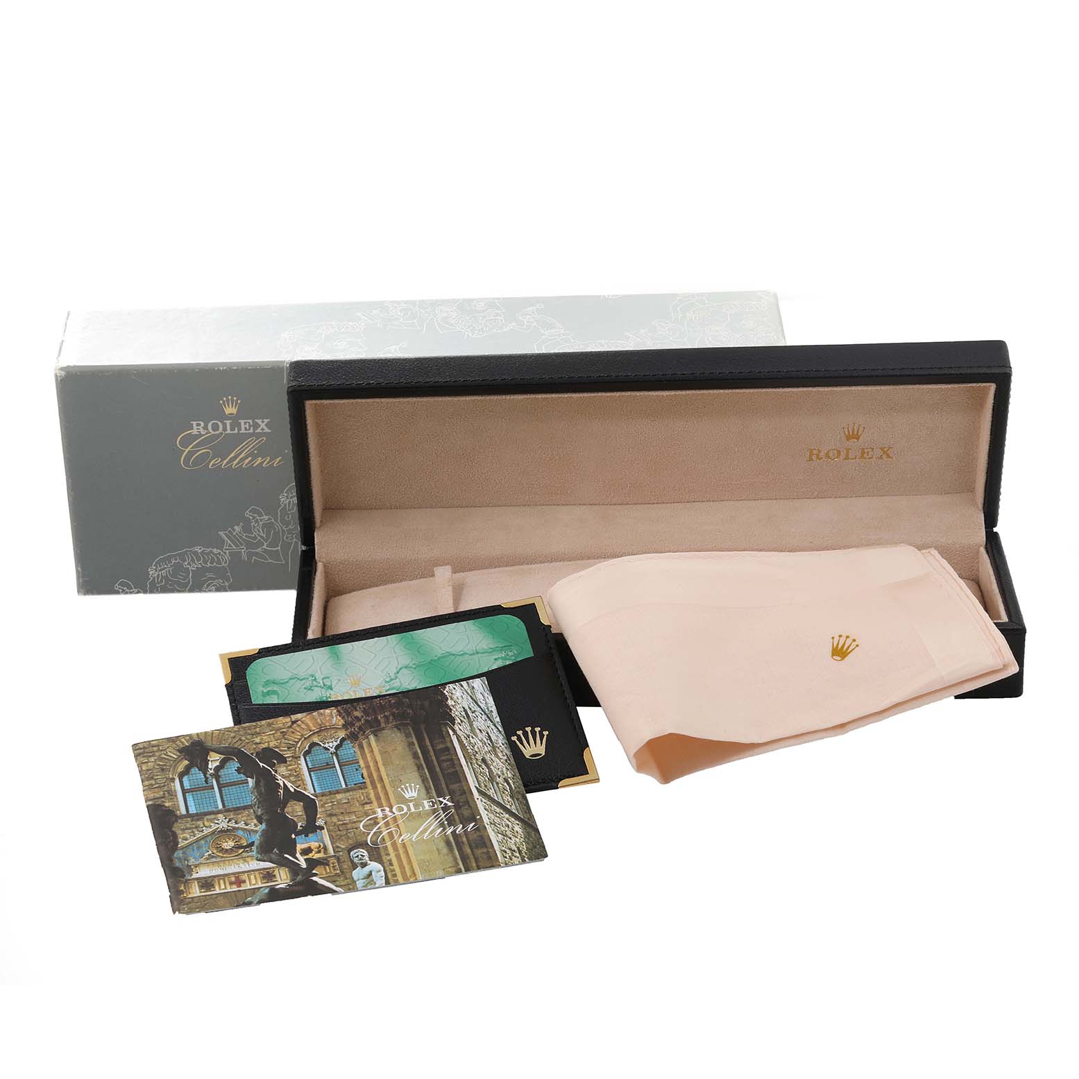 The image shows the packaging and accessories of the Rolex Cellini 4233/9 Men's White Gold White Dial 4233/9 Men's White Gold White Dial model, including the box, cleaning cloth, and documentation.