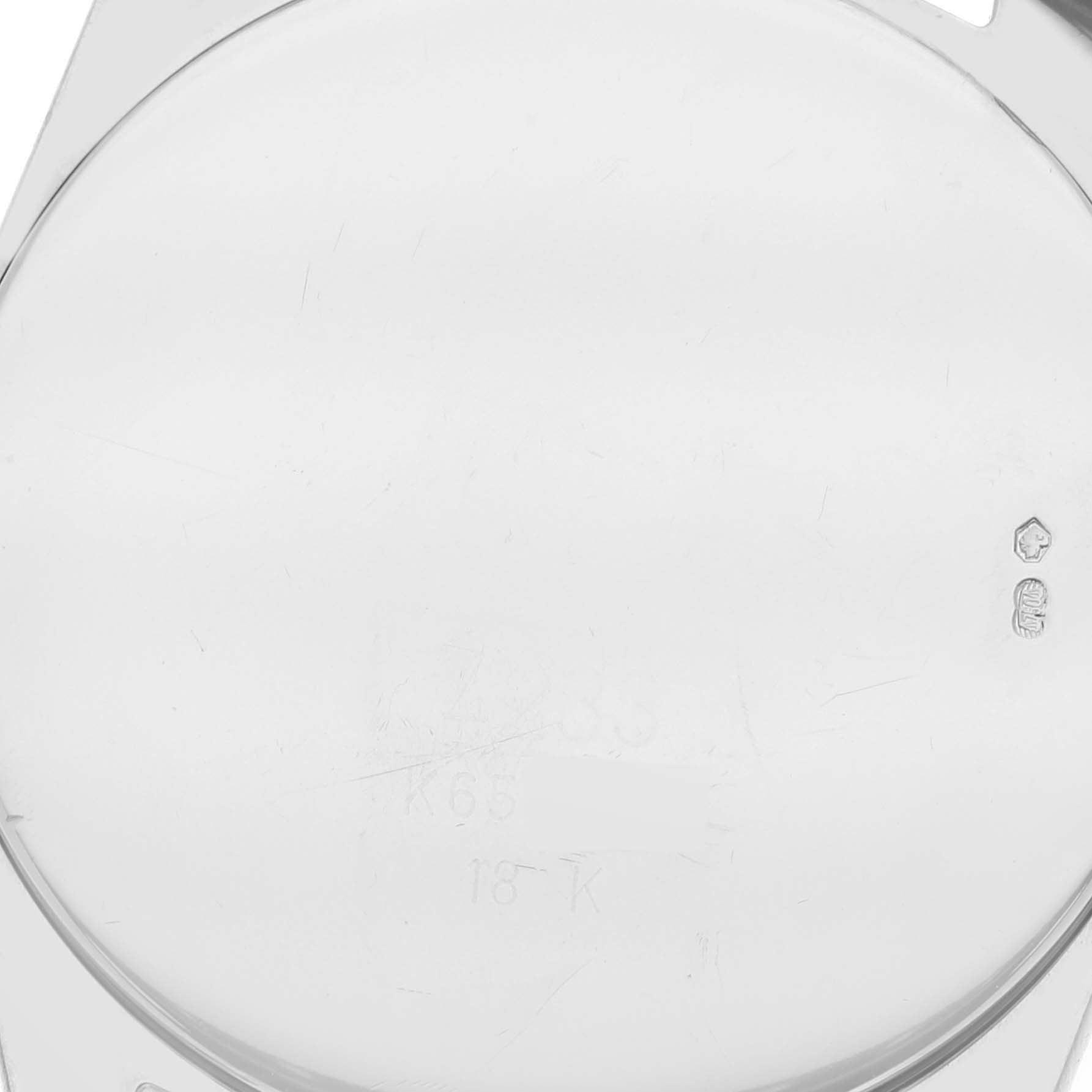 This image shows the rear case back of the Rolex Cellini 4233/9 Men's White Gold White Dial 4233/9 Men's White Gold White Dial watch.