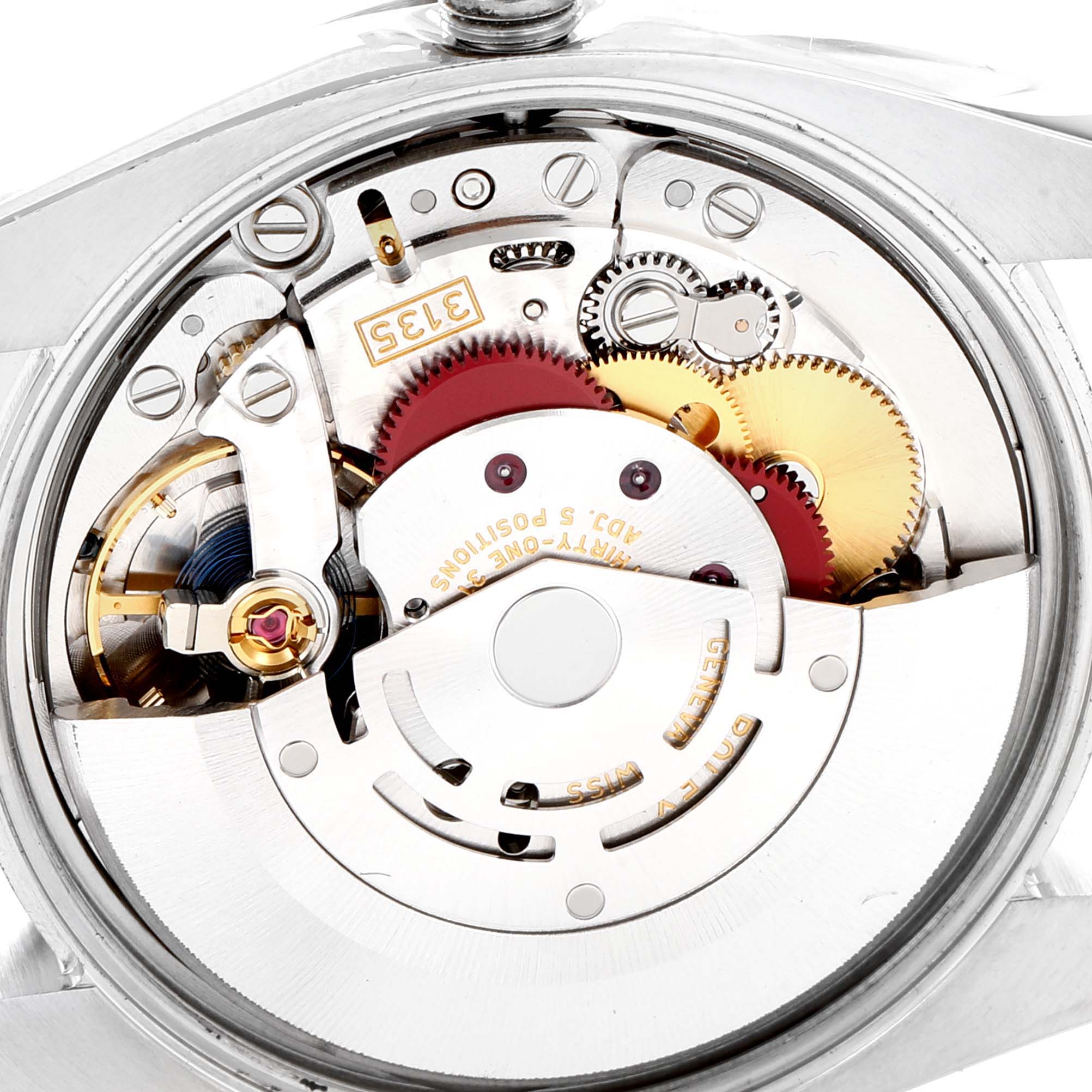 This image shows a close-up of the movement mechanism of the Rolex Date 115200 Men's Stainless Steel Silver Dial 115200 Men's Stainless Steel Silver Dial watch model.