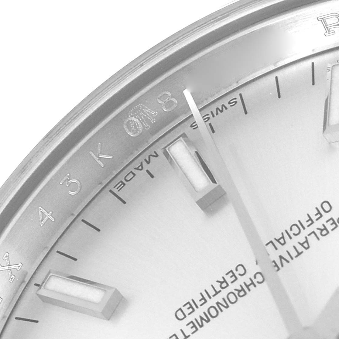 The image shows a close-up view of the dial and bezel of a Rolex Date 115200 Men's Stainless Steel Silver Dial 115200 Men's Stainless Steel Silver Dial model watch.