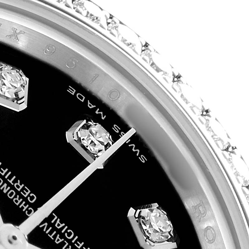The image shows a close-up of the dial and diamond markers of a Rolex Datejust 179384 Women's Stainless Steel Black Dial, viewed at an angle highlighting the bezel and part of the minute hand.