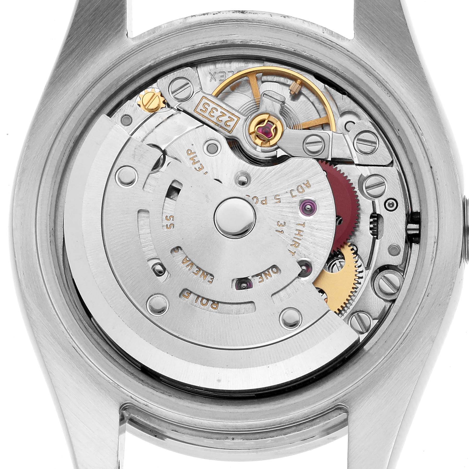 The image shows the back view of a Rolex Datejust 179384 Women's Stainless Steel Black Dial, highlighting its exposed movement and intricate internal components.