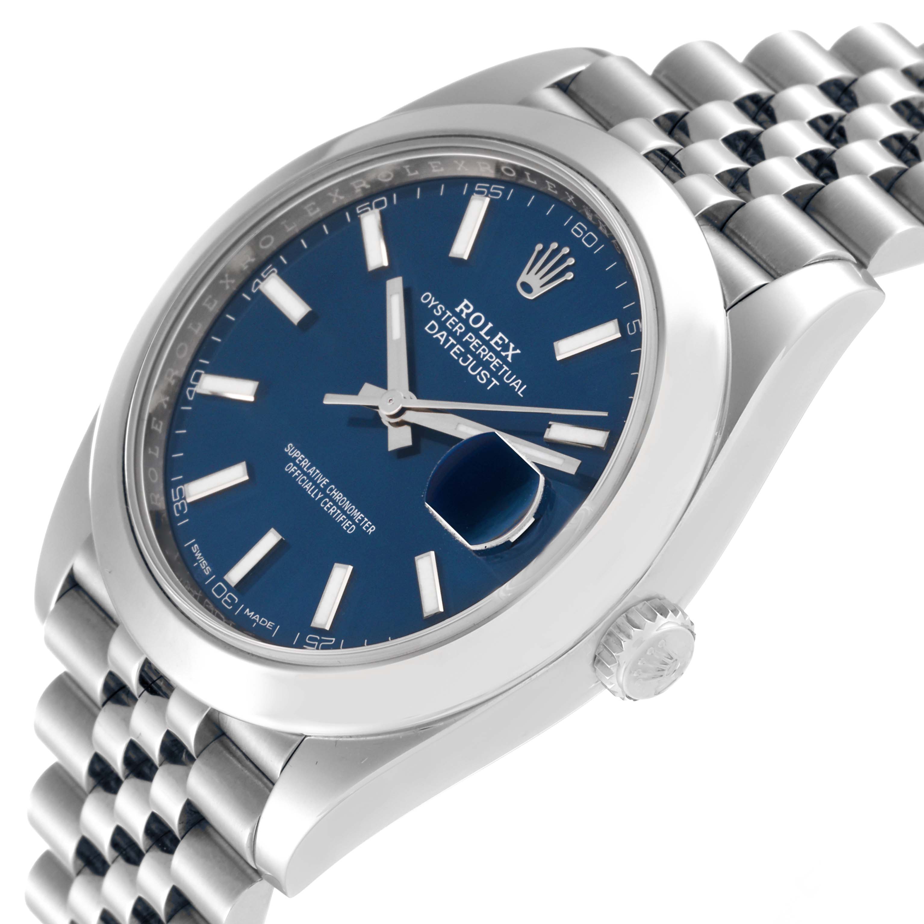 The image shows a Rolex Datejust 41 126300 Men
s Stainless Steel Blue Dial 126300 Men
s Stainless Steel Blue Dial model watch from an angled side view, highlighting the dial, bezel, crown, and part of the bracelet.