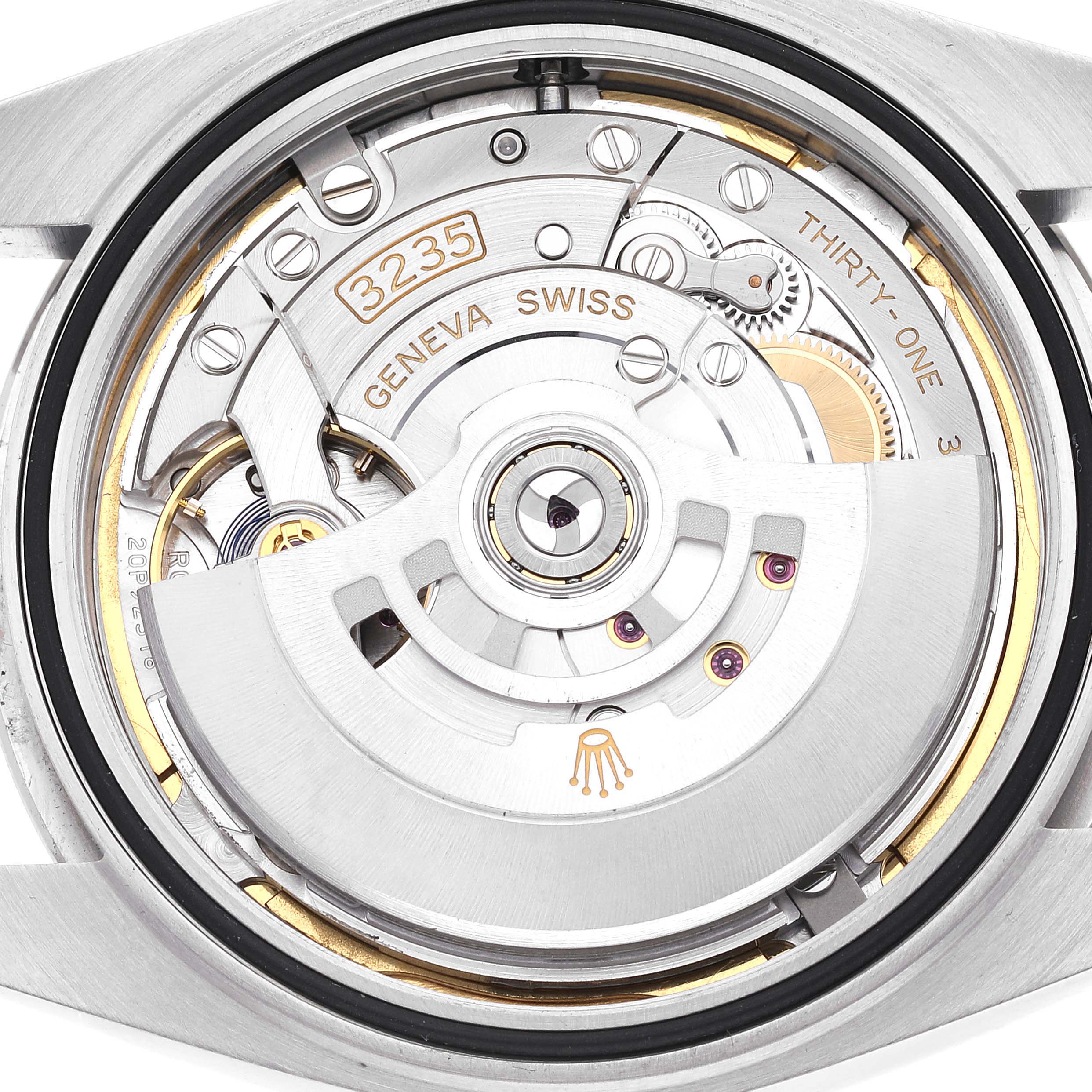 The image shows the Rolex Datejust 41 126300 Men
s Stainless Steel Blue Dial 126300 Men
s Stainless Steel Blue Dial
s movement from the back, displaying the intricate inner mechanism.