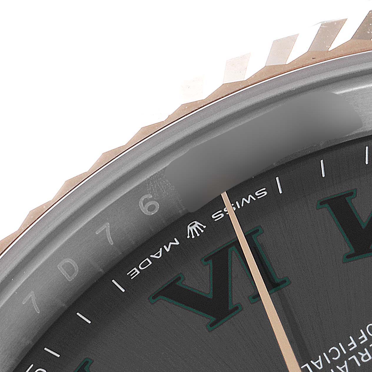 This image shows a close-up of the bezel and part of the dial of a Rolex Datejust 41 126331 Men's Steel and Gold (two tone) Grey Dial 126331 Men's Steel and Gold (two tone) Grey Dial watch.