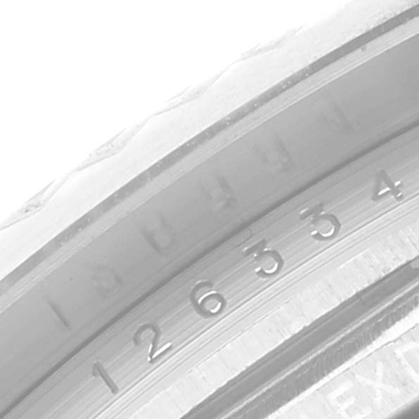 The image shows a close-up of the Rolex Datejust 41 126334 Men
s Stainless Steel Blue Dial 126334 Men
s Stainless Steel Blue Dial
s engraved inner bezel.