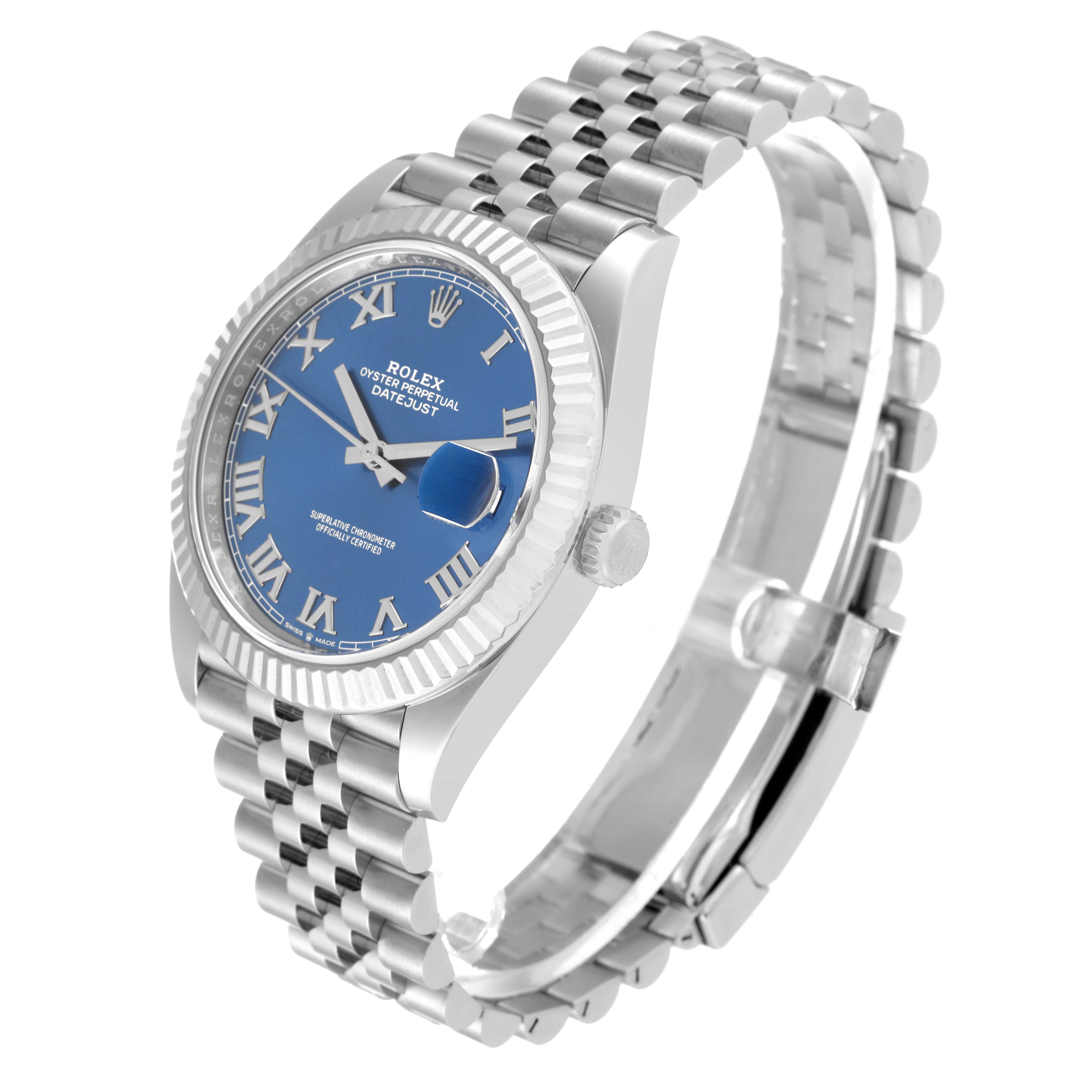 The image shows a Rolex Datejust 41 126334 Men
s Stainless Steel Blue Dial 126334 Men
s Stainless Steel Blue Dial watch from a side angle, displaying its blue dial, silver case, and jubilee bracelet.