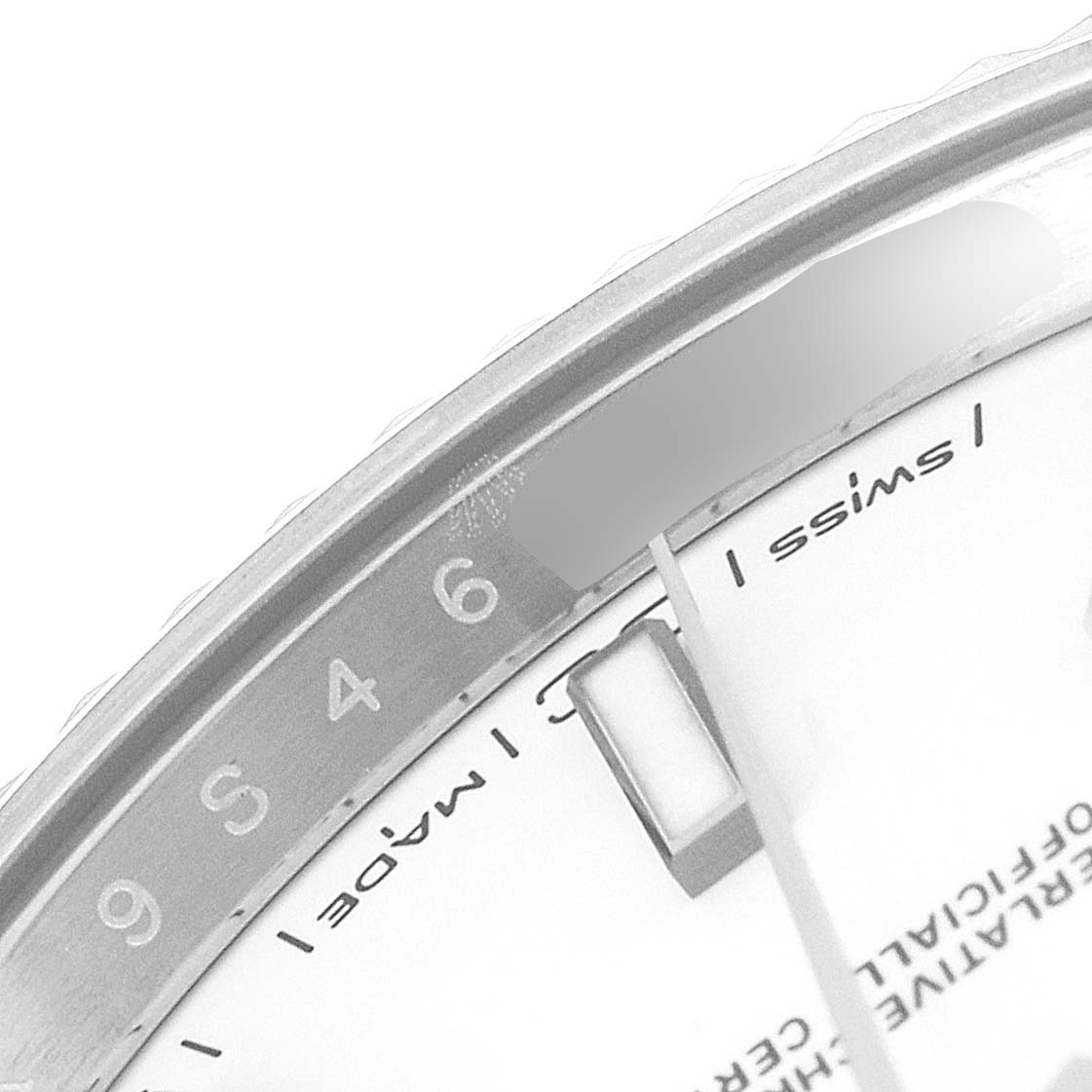 This image shows a close-up of the dial and part of the bezel of the Rolex Datejust 41 126334 Men
s Stainless Steel White Dial 126334 Men
s Stainless Steel White Dial, including the numbers and "Swiss Made" text.