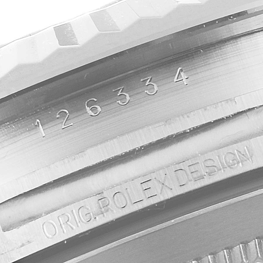 The image shows a close-up of the model number and "ORIG. ROLEX DESIGN" engraving on the case of a Rolex Datejust 41 126334 Men
s Stainless Steel White Dial 126334 Men
s Stainless Steel White Dial watch.