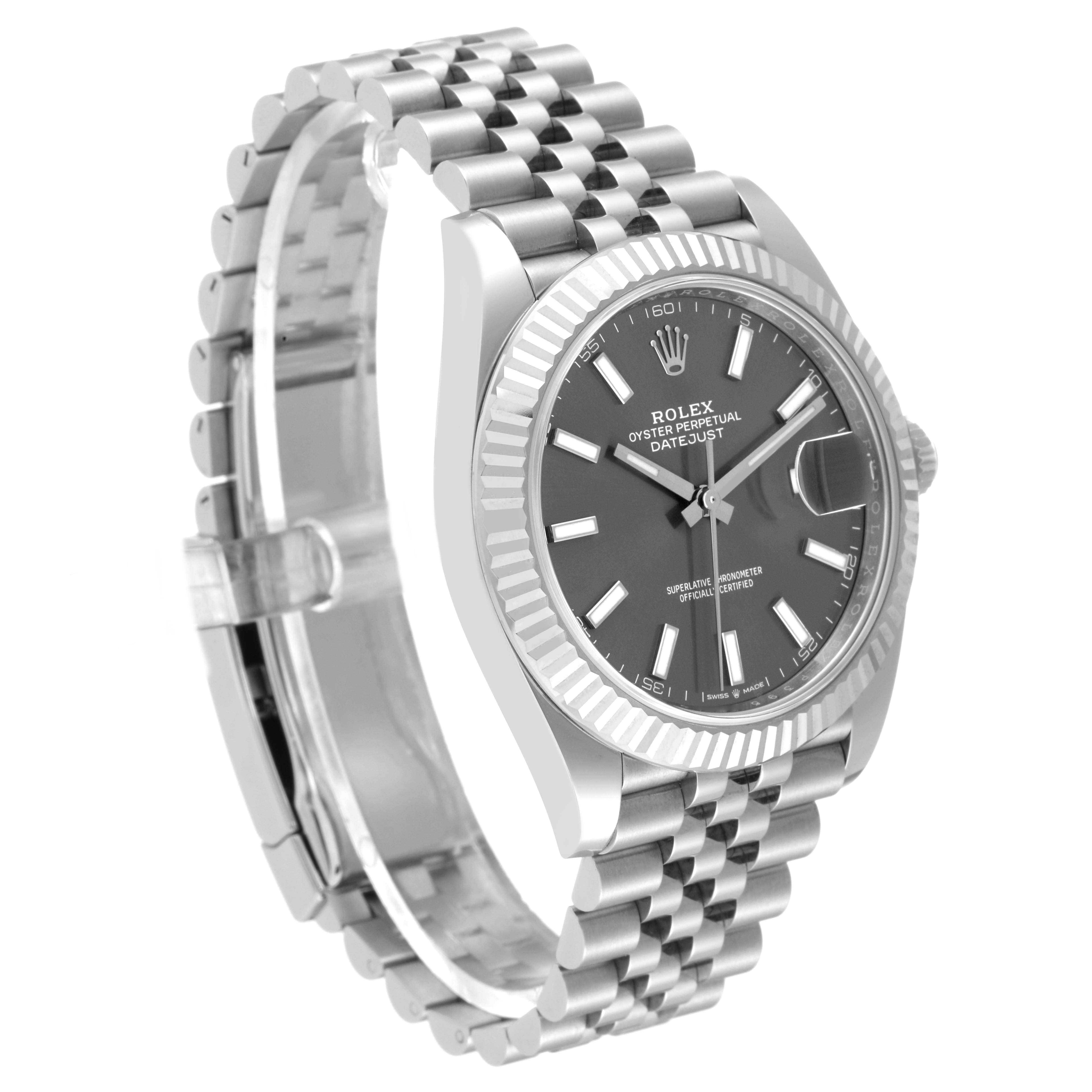 This Rolex Datejust 41 126334 Men
s Stainless Steel Grey Dial 126334 Men
s Stainless Steel Grey Dial model is shown in a three-quarter angle, displaying its face, fluted bezel, and Jubilee bracelet.