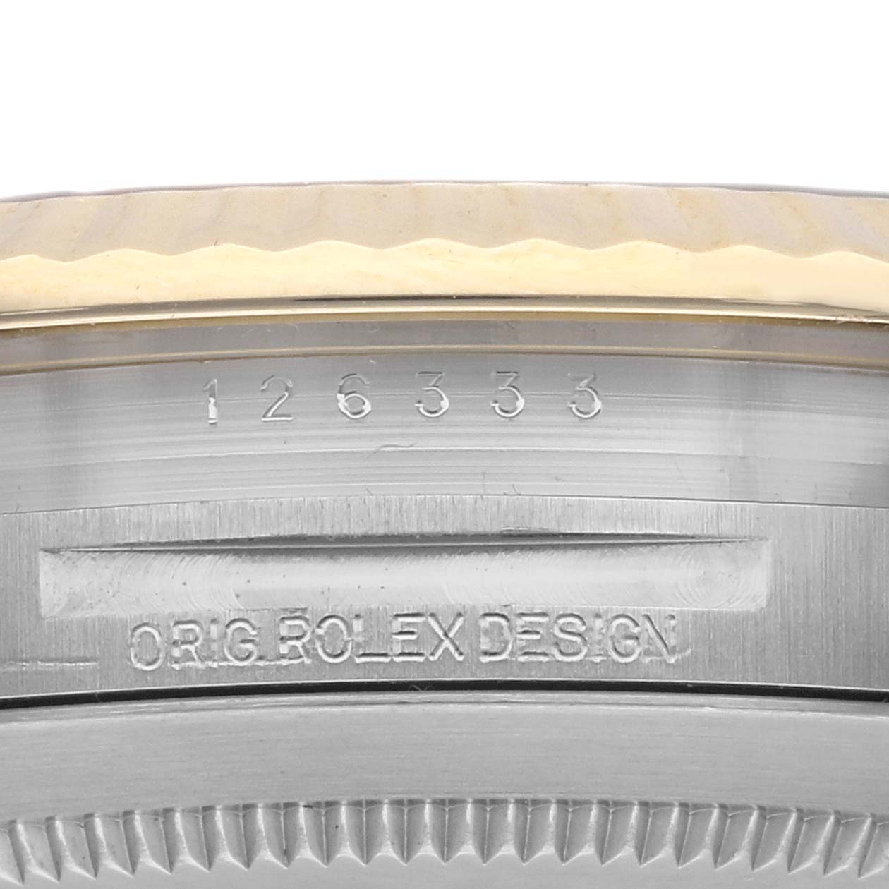 The image shows the side of the Rolex Datejust 41 126333 Men's Steel and Gold (two tone) Champagne Dial 126333 Men's Steel and Gold (two tone) Champagne Dial, featuring the serial number and "Orig Rolex Design" engraving.
