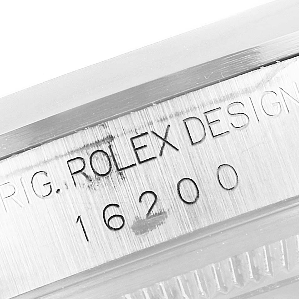 This close-up image shows the side case engraving with the model number "16200" of a Rolex Datejust 16200 Men
s Stainless Steel Blue Dial 16200 Men
s Stainless Steel Blue Dial watch.