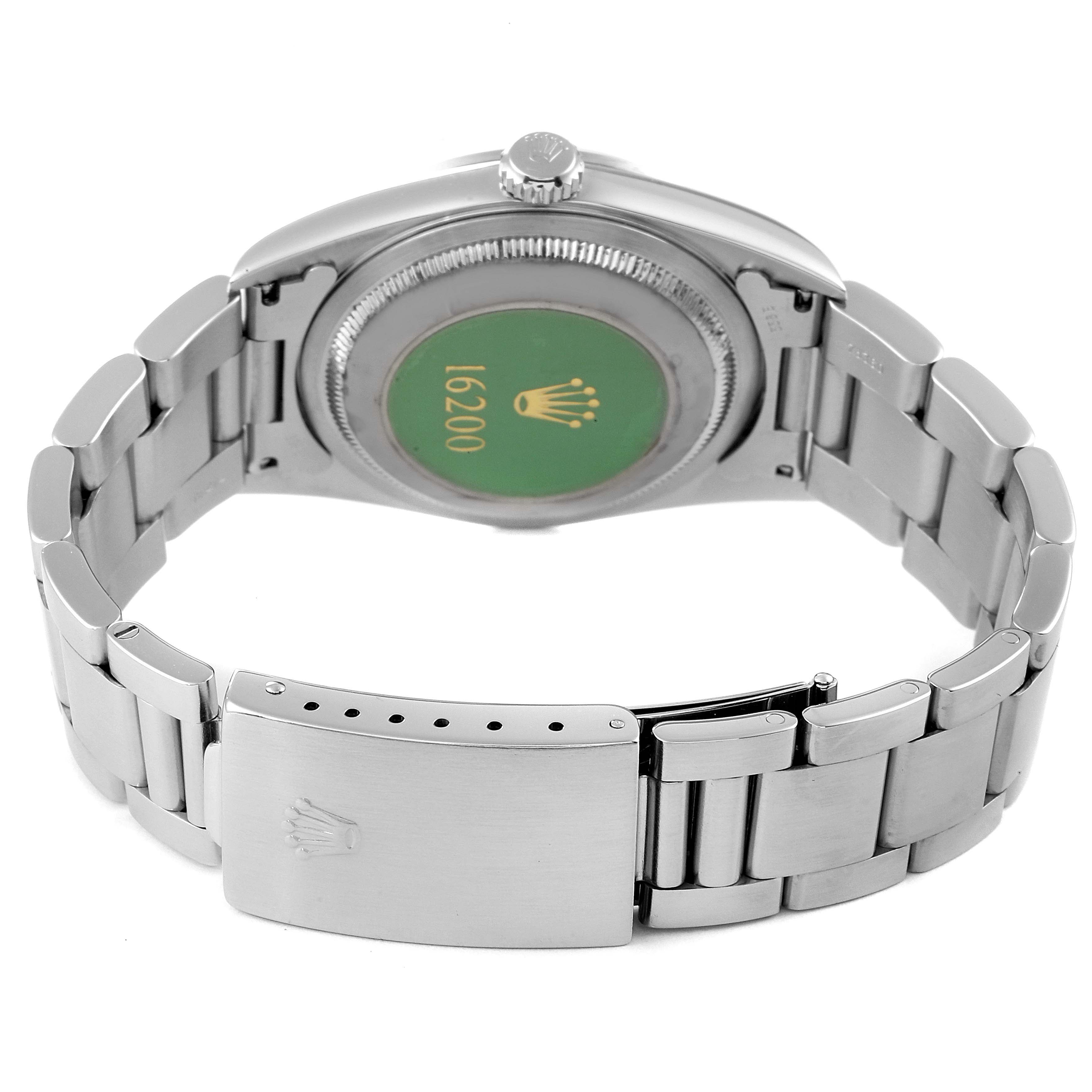 This image shows the back and bracelet clasp of a Rolex Datejust 16200 Men
s Stainless Steel Blue Dial 16200 Men
s Stainless Steel Blue Dial watch, highlighting its metal band and case back.