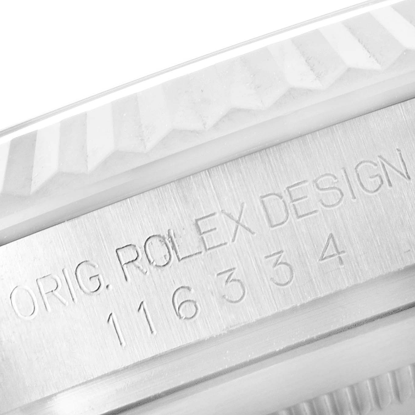 This close-up image shows the model and design engraving on the side of the Rolex Datejust 41 116334 Men's Stainless Steel Blue Dial 116334 Men's Stainless Steel Blue Dial watch case.